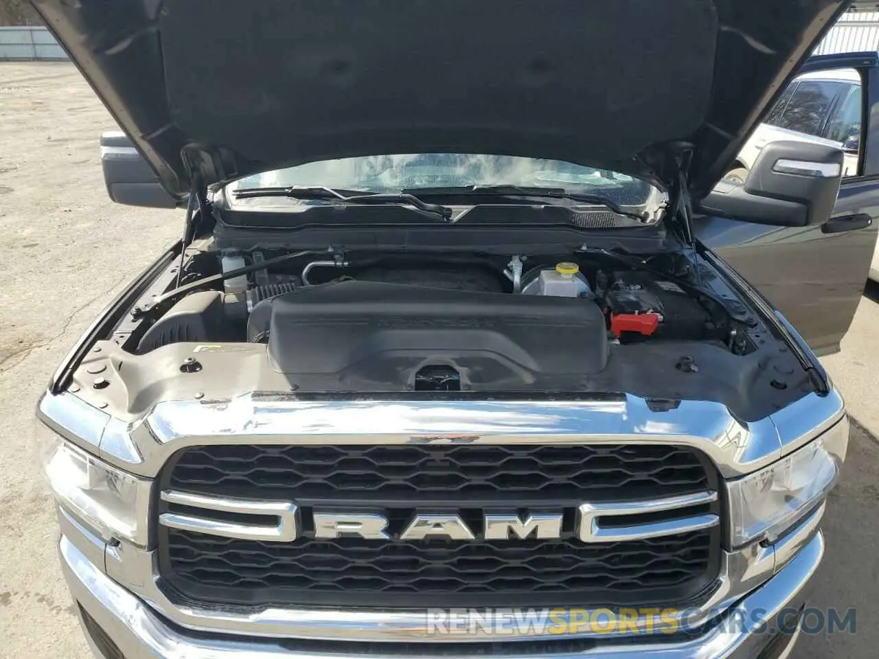11 Photograph of a damaged car 3C6UR5CJ8RG171586 RAM 2500 2024