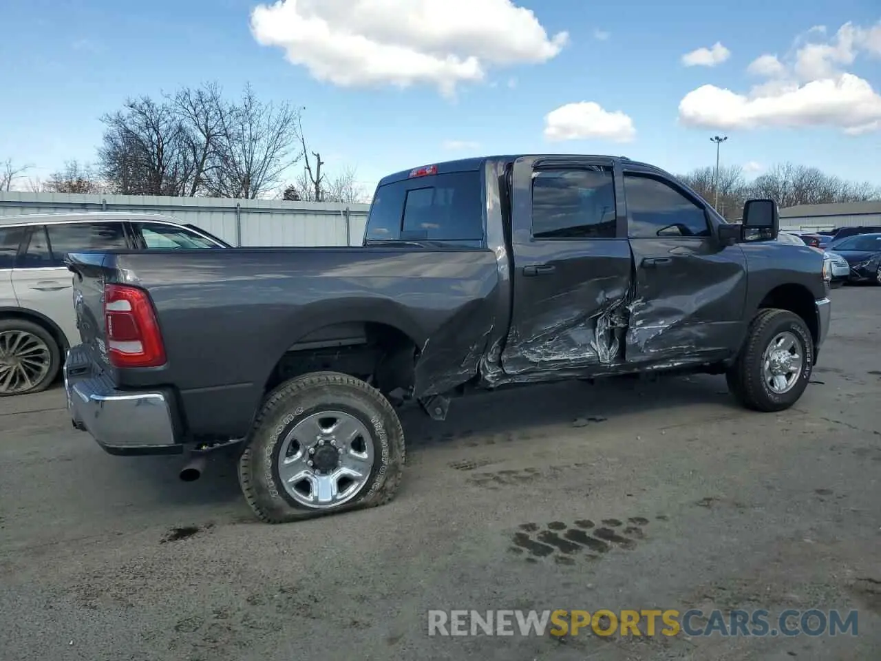 3 Photograph of a damaged car 3C6UR5CJ8RG171586 RAM 2500 2024