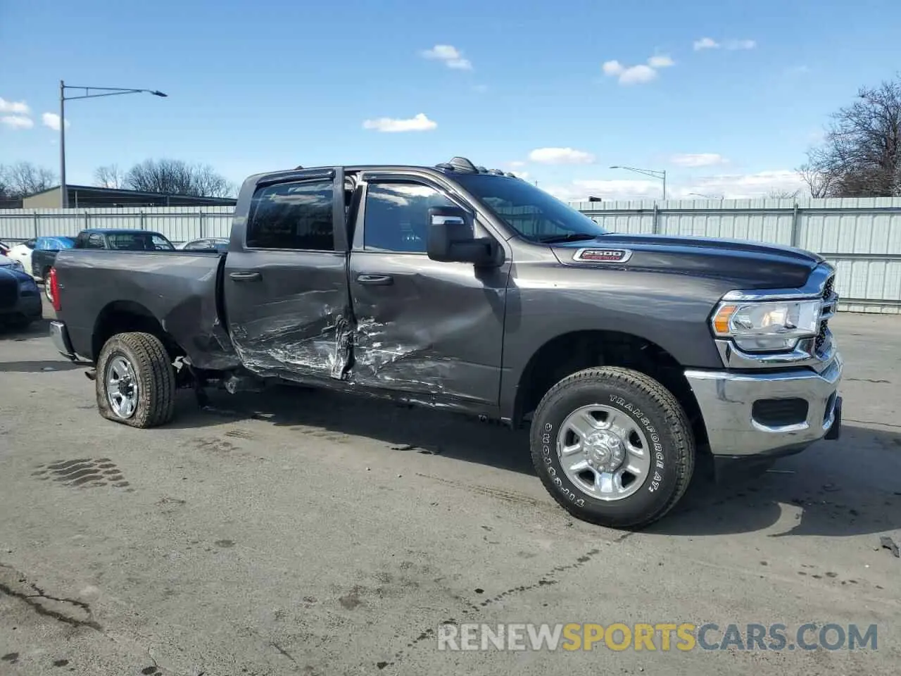 4 Photograph of a damaged car 3C6UR5CJ8RG171586 RAM 2500 2024