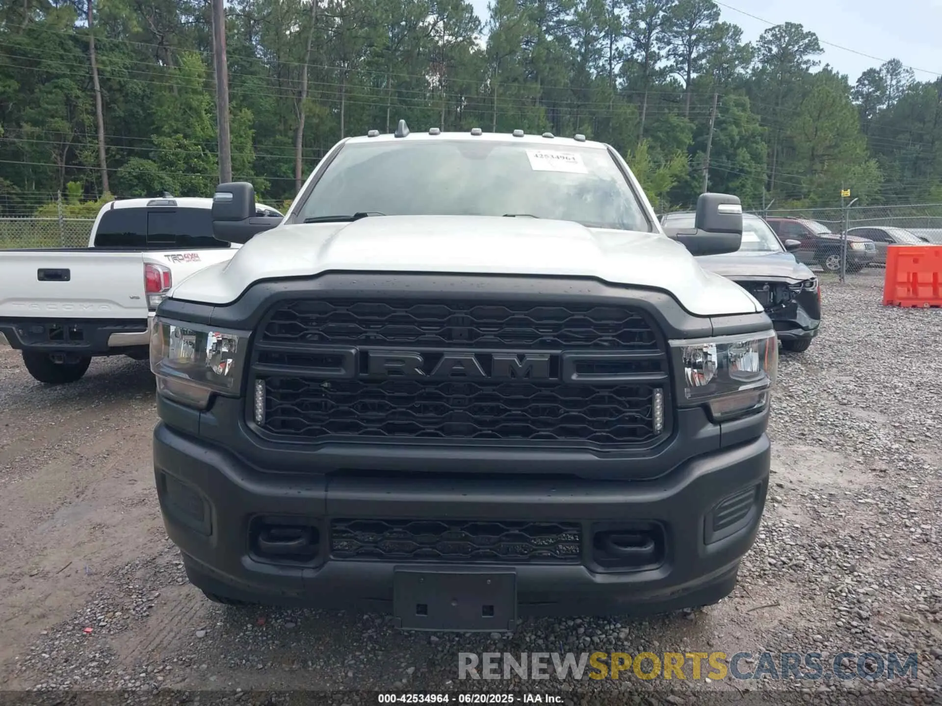 12 Photograph of a damaged car 3C6UR5CJXRG237863 RAM 2500 2024