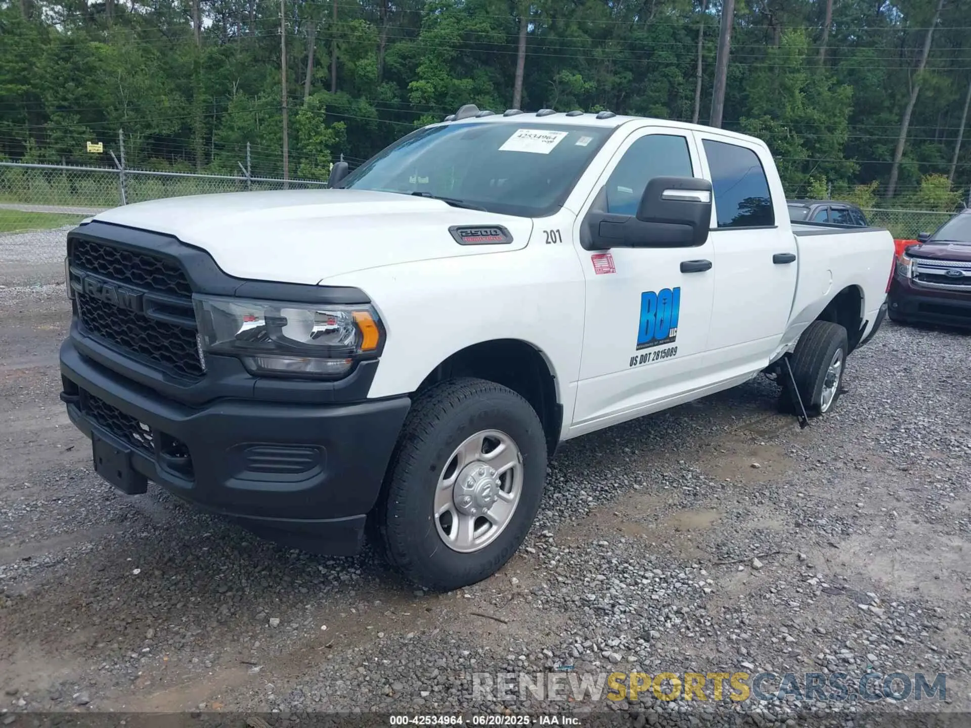2 Photograph of a damaged car 3C6UR5CJXRG237863 RAM 2500 2024