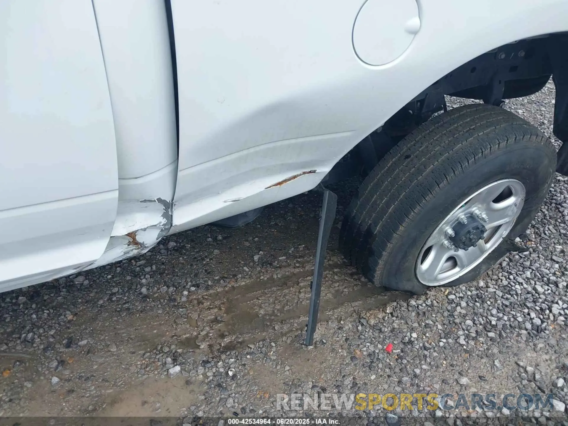 6 Photograph of a damaged car 3C6UR5CJXRG237863 RAM 2500 2024