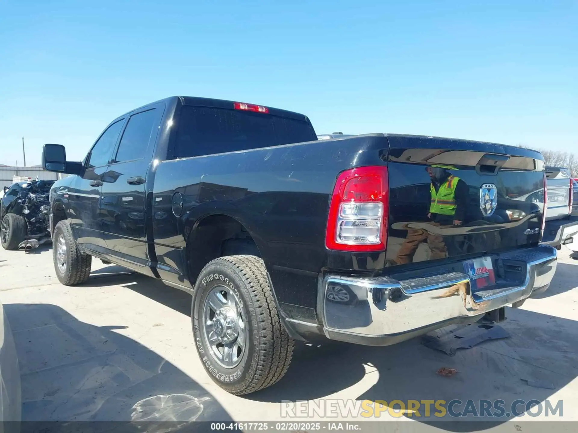 14 Photograph of a damaged car 3C6UR5CL0RG264829 RAM 2500 2024