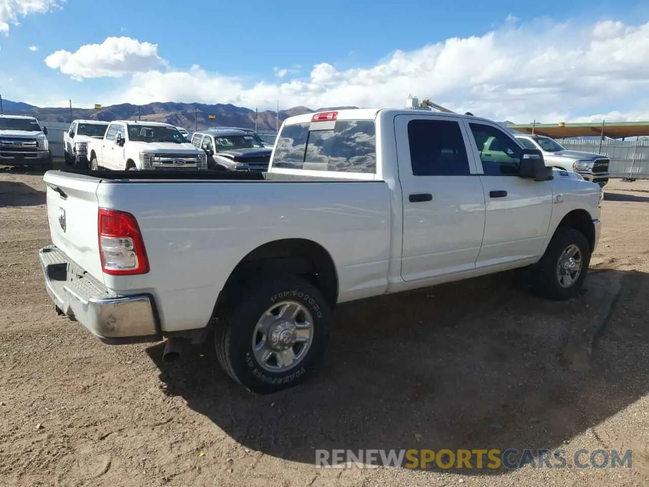 3 Photograph of a damaged car 3C6UR5CL7RG216115 RAM 2500 2024