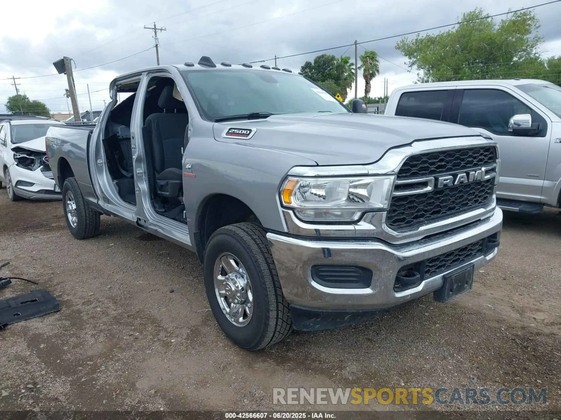 1 Photograph of a damaged car 3C6UR5CL8RG212784 RAM 2500 2024