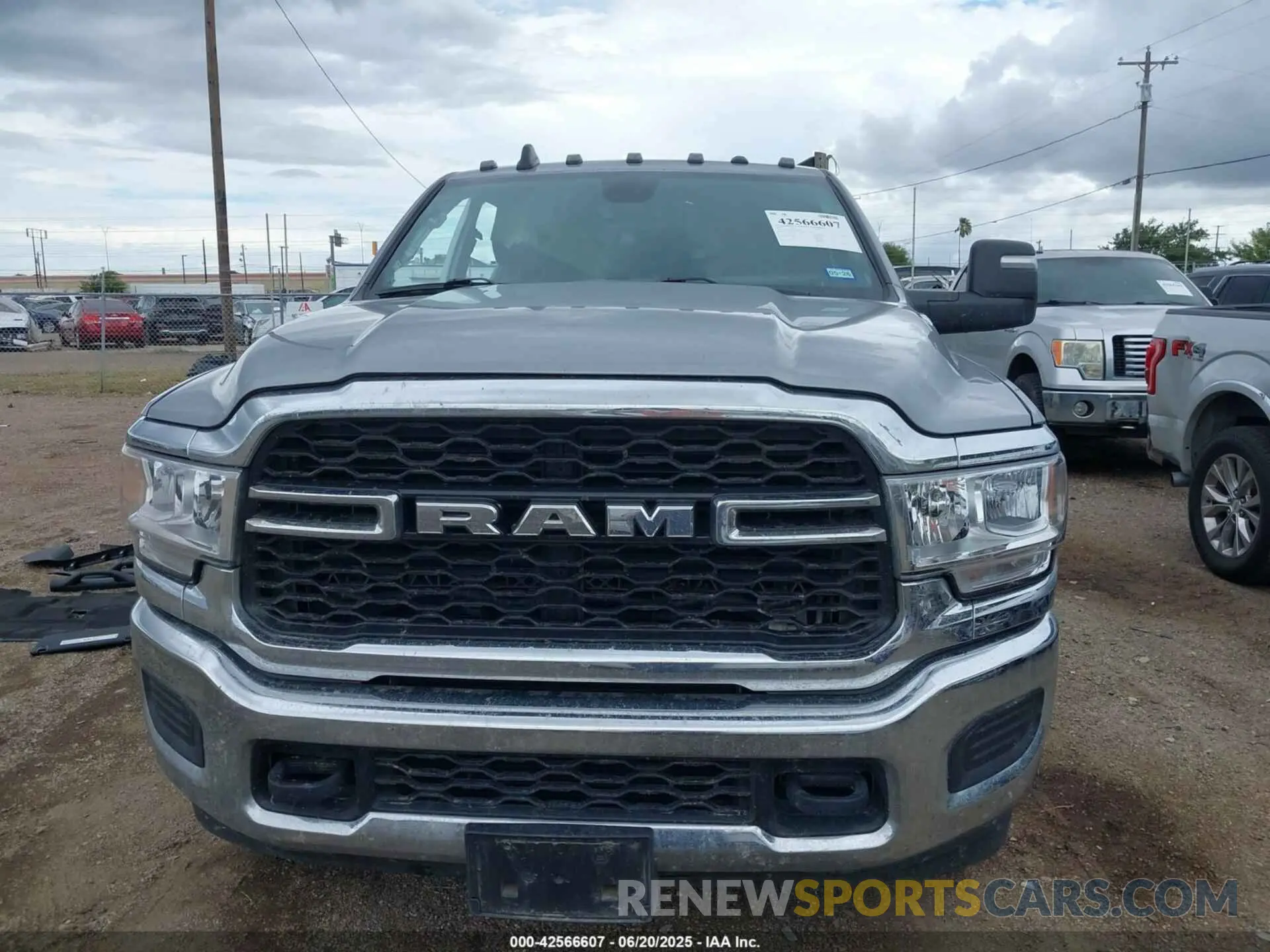 13 Photograph of a damaged car 3C6UR5CL8RG212784 RAM 2500 2024