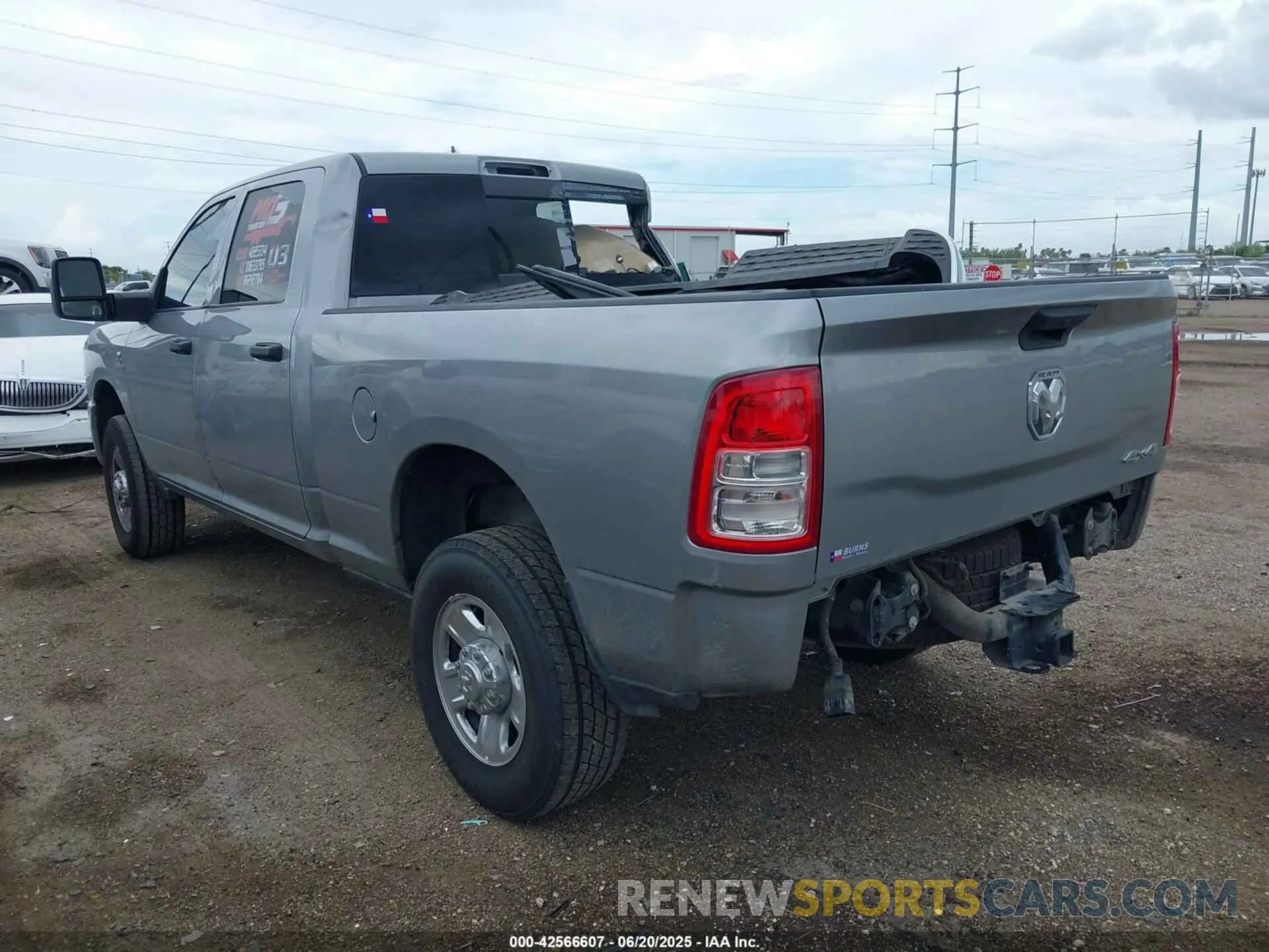 3 Photograph of a damaged car 3C6UR5CL8RG212784 RAM 2500 2024