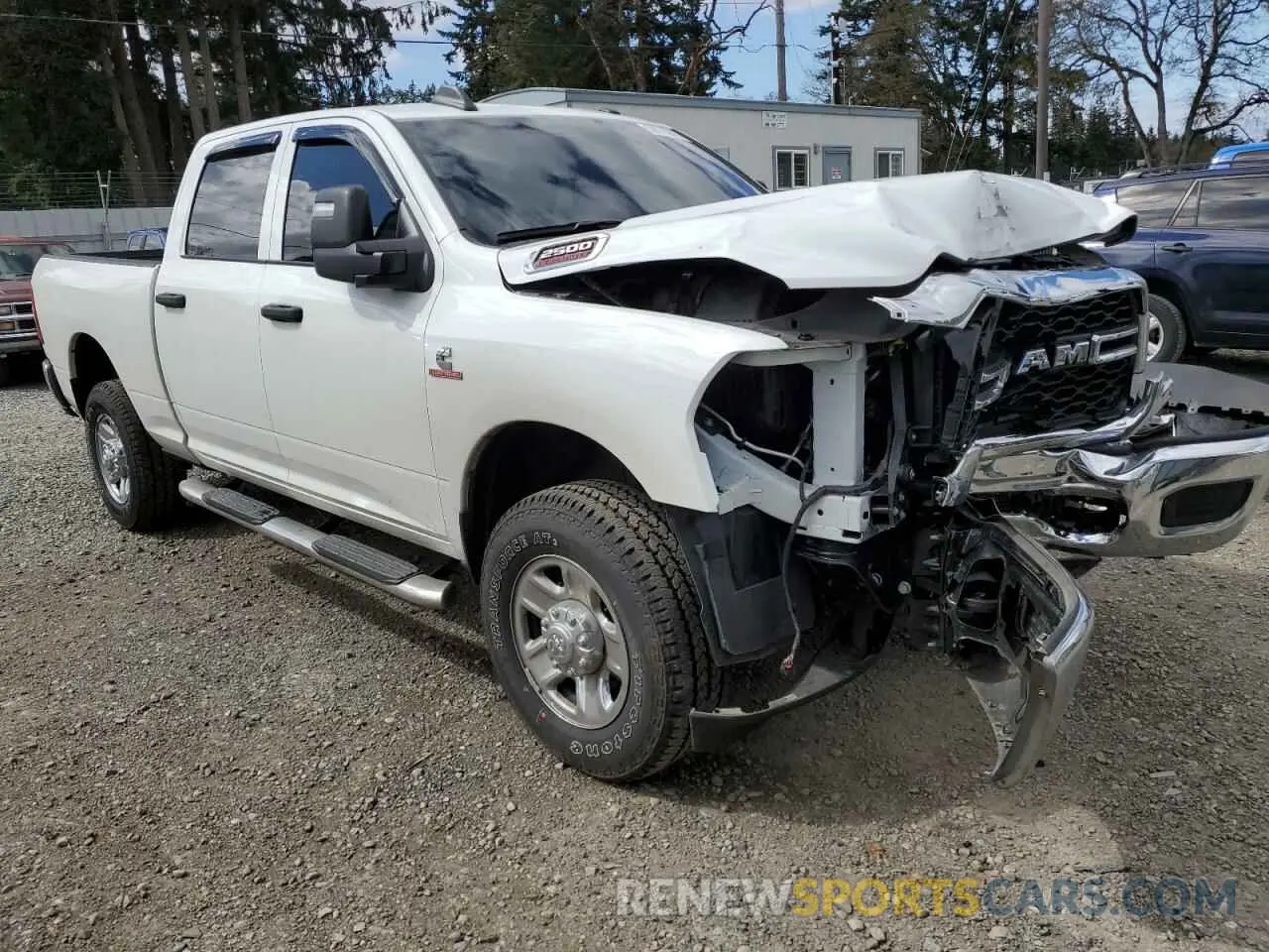 4 Photograph of a damaged car 3C6UR5CL8RG298811 RAM 2500 2024