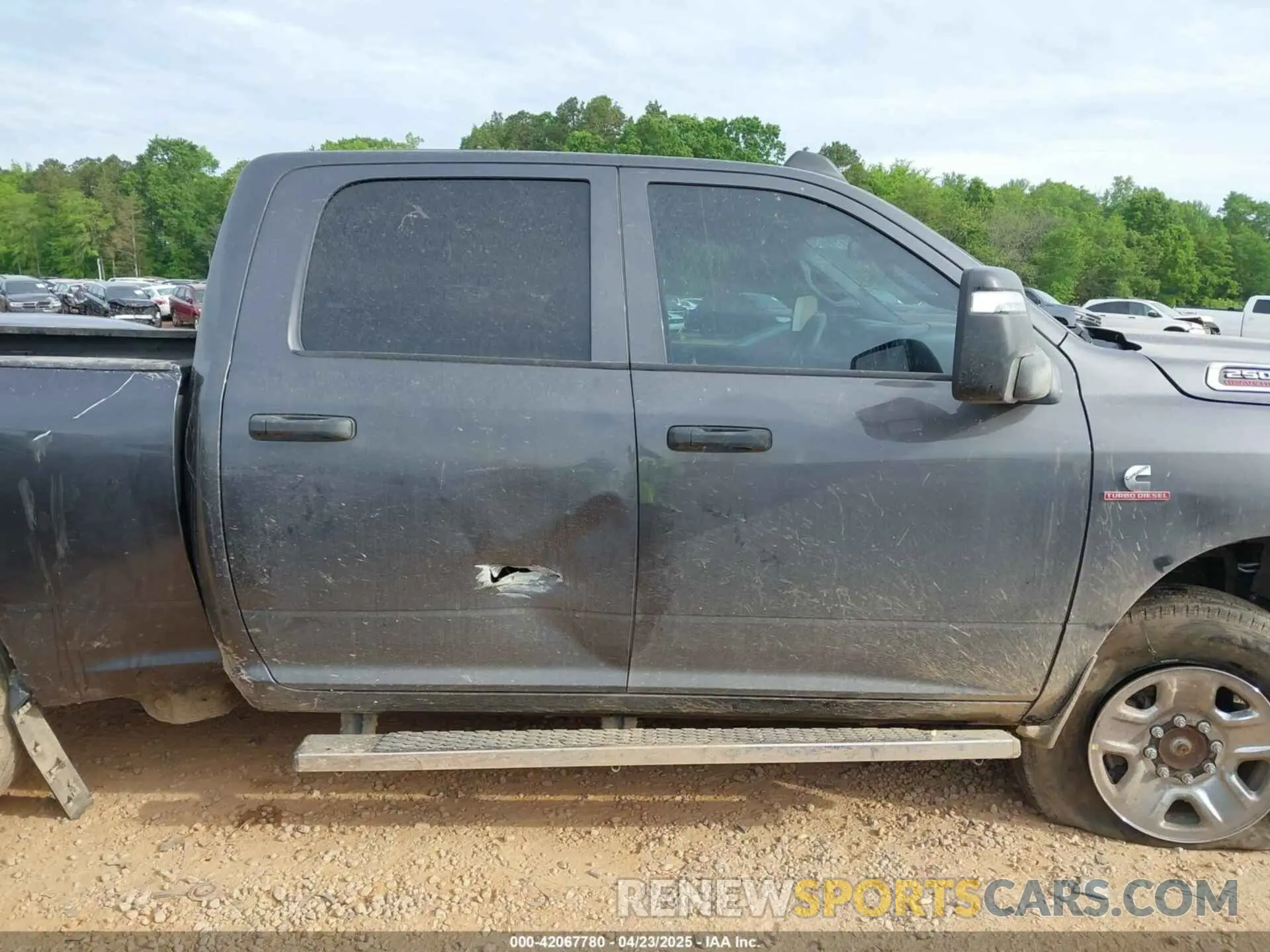 13 Photograph of a damaged car 3C6UR5CL9RG245468 RAM 2500 2024