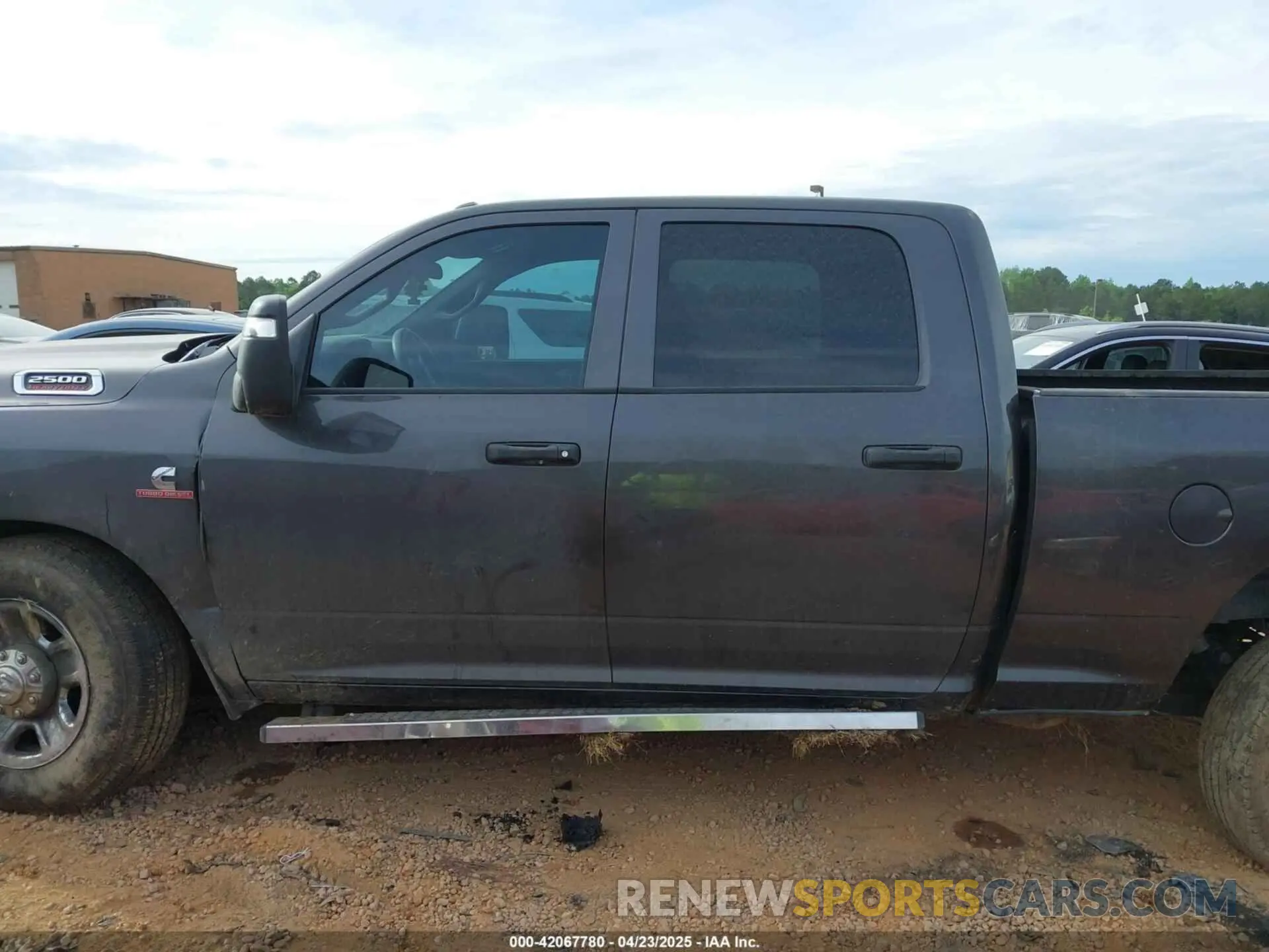 14 Photograph of a damaged car 3C6UR5CL9RG245468 RAM 2500 2024