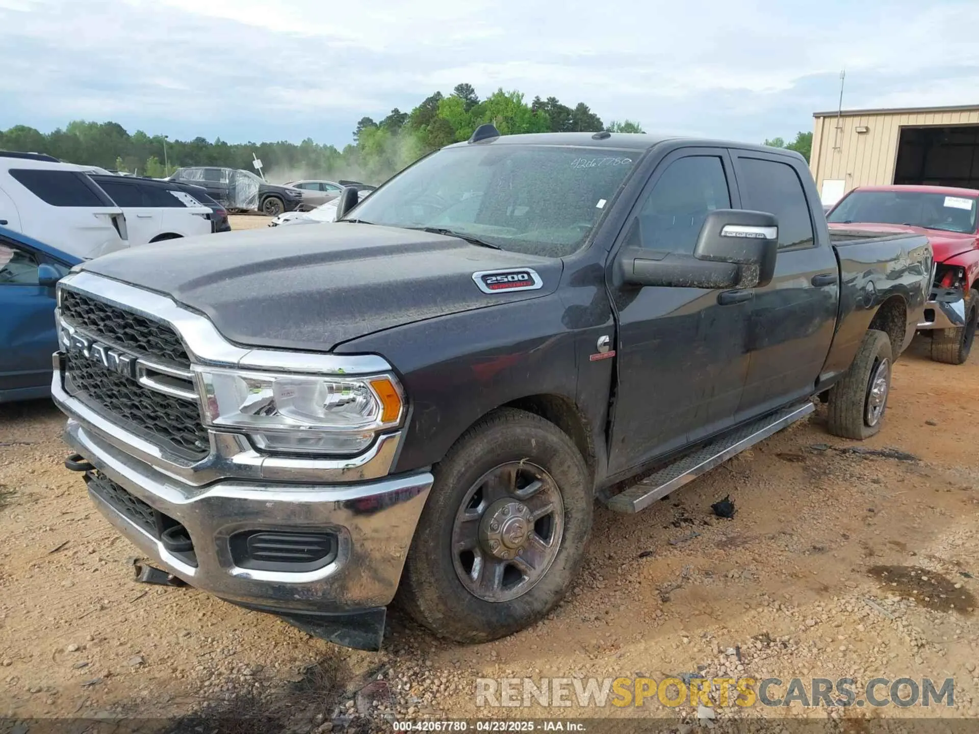 2 Photograph of a damaged car 3C6UR5CL9RG245468 RAM 2500 2024