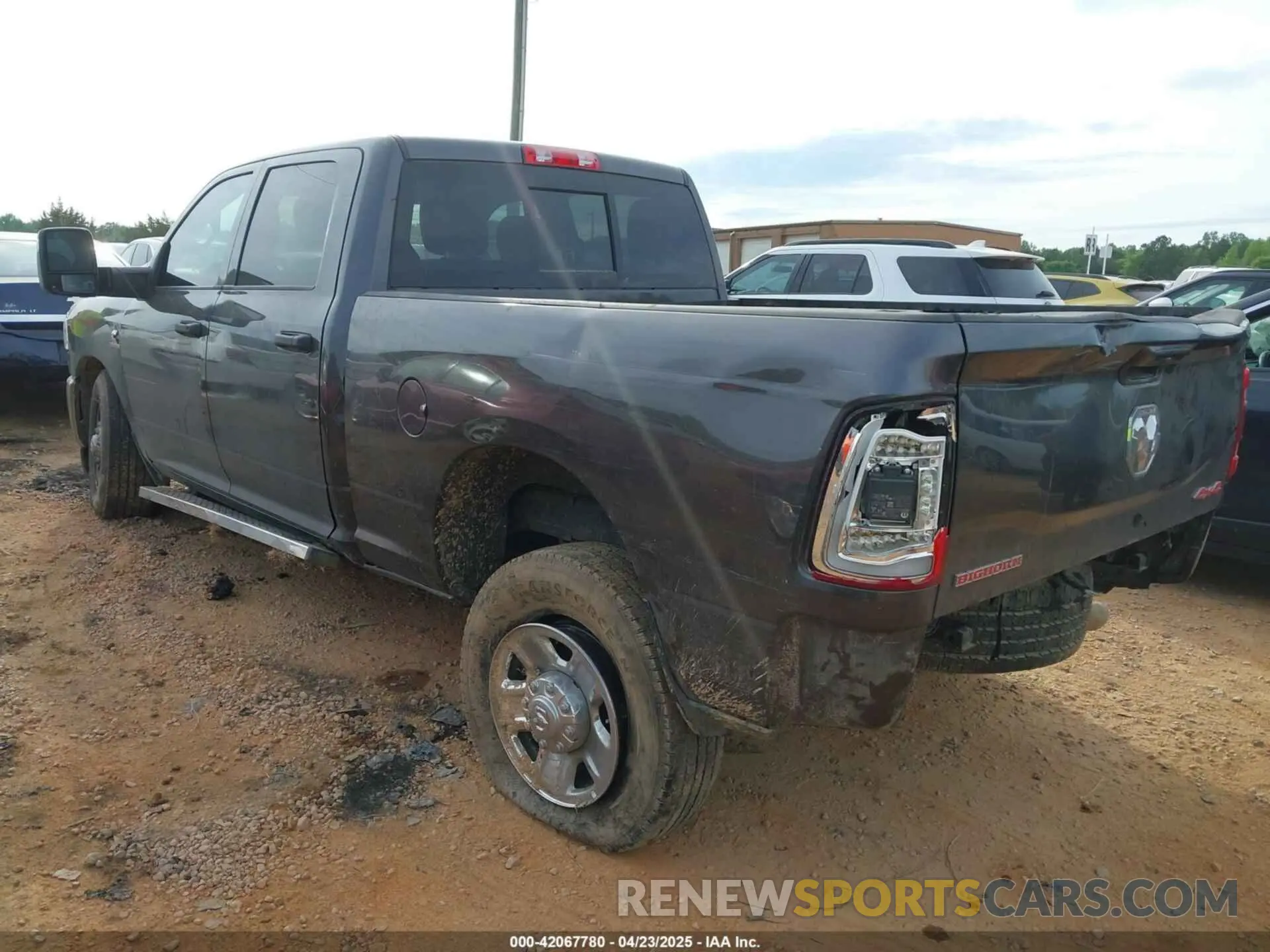 3 Photograph of a damaged car 3C6UR5CL9RG245468 RAM 2500 2024