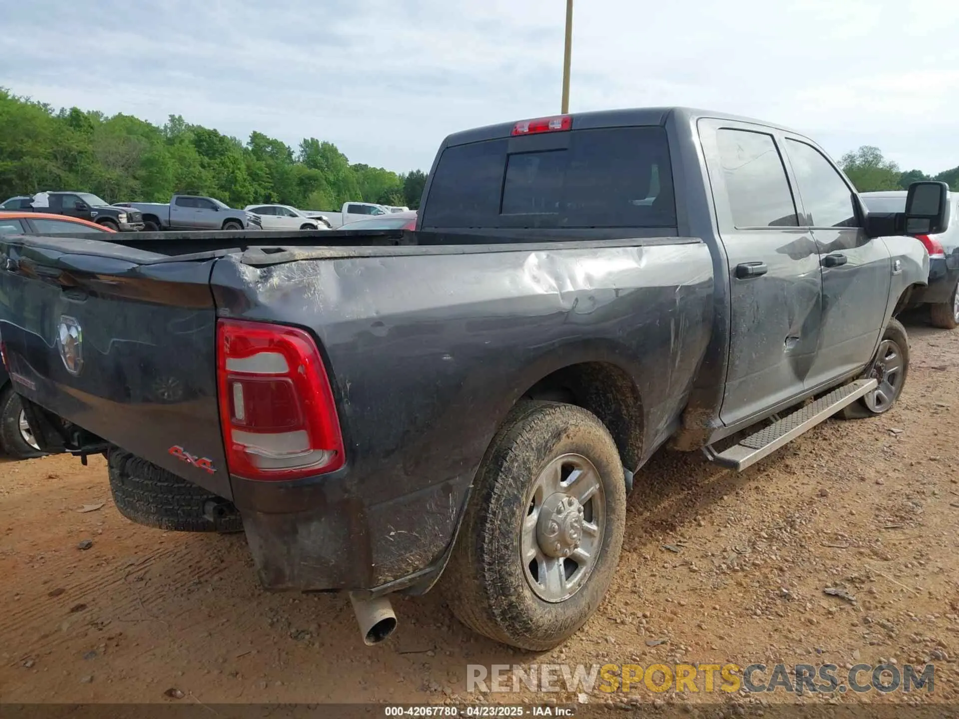 4 Photograph of a damaged car 3C6UR5CL9RG245468 RAM 2500 2024