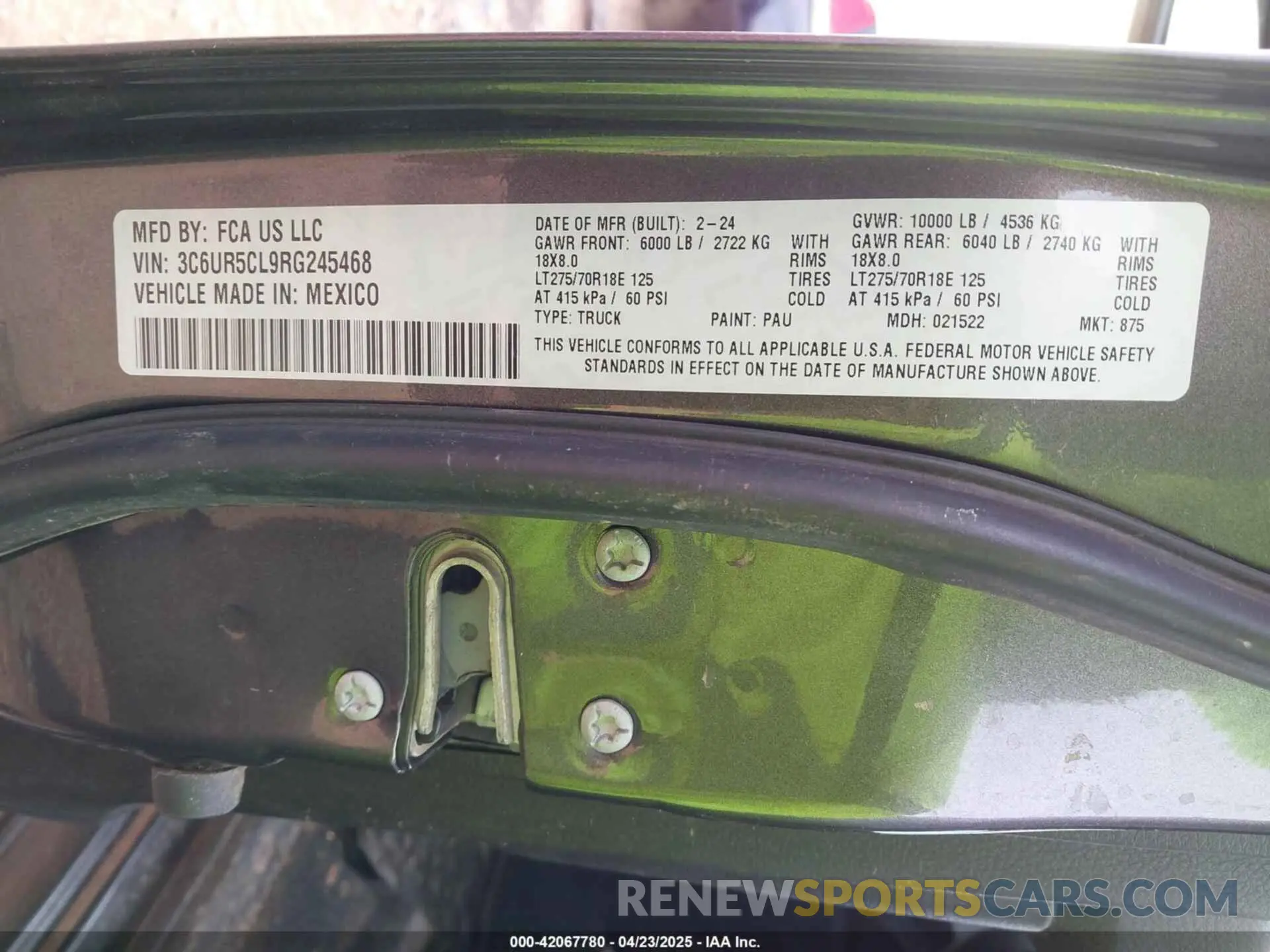 9 Photograph of a damaged car 3C6UR5CL9RG245468 RAM 2500 2024