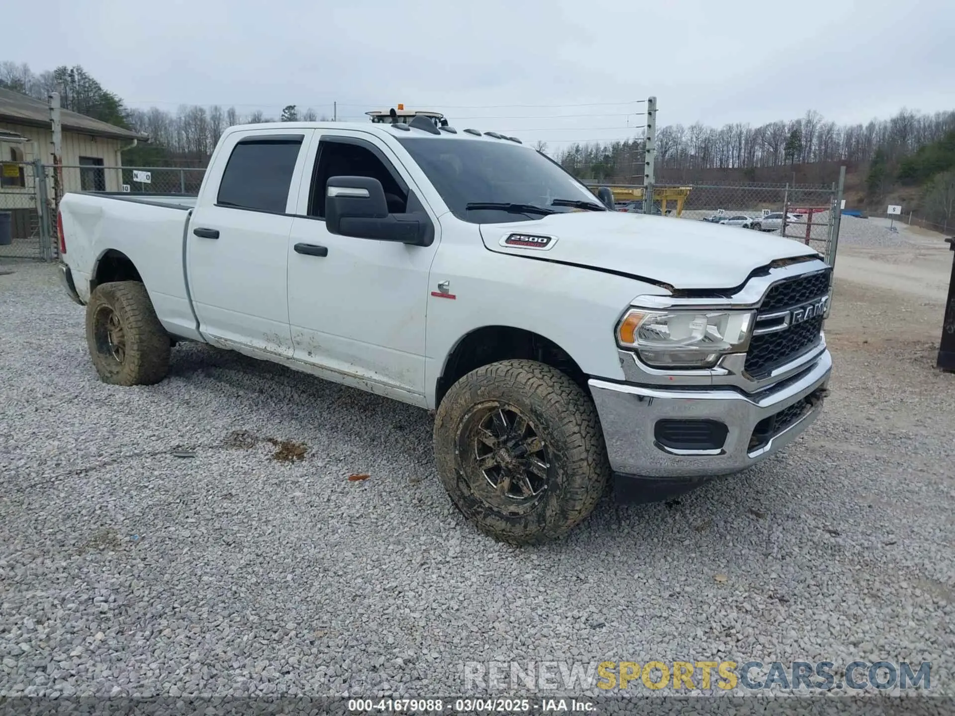 1 Photograph of a damaged car 3C6UR5CLXRG116848 RAM 2500 2024
