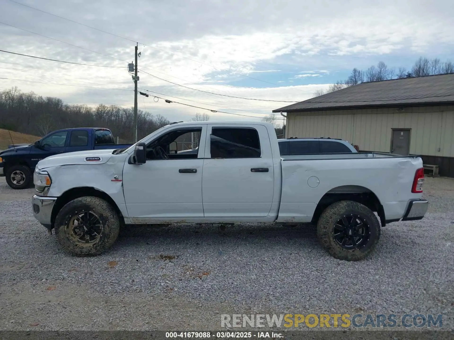 14 Photograph of a damaged car 3C6UR5CLXRG116848 RAM 2500 2024