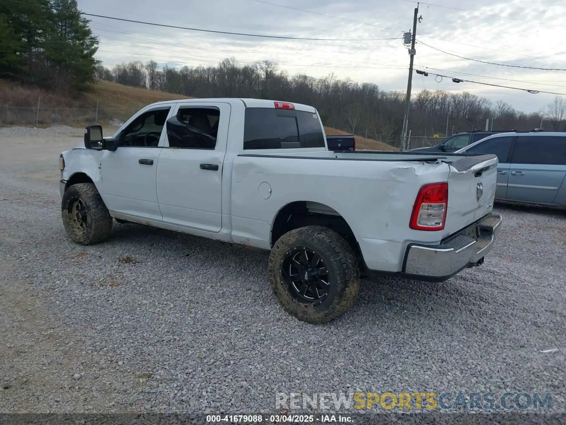 3 Photograph of a damaged car 3C6UR5CLXRG116848 RAM 2500 2024