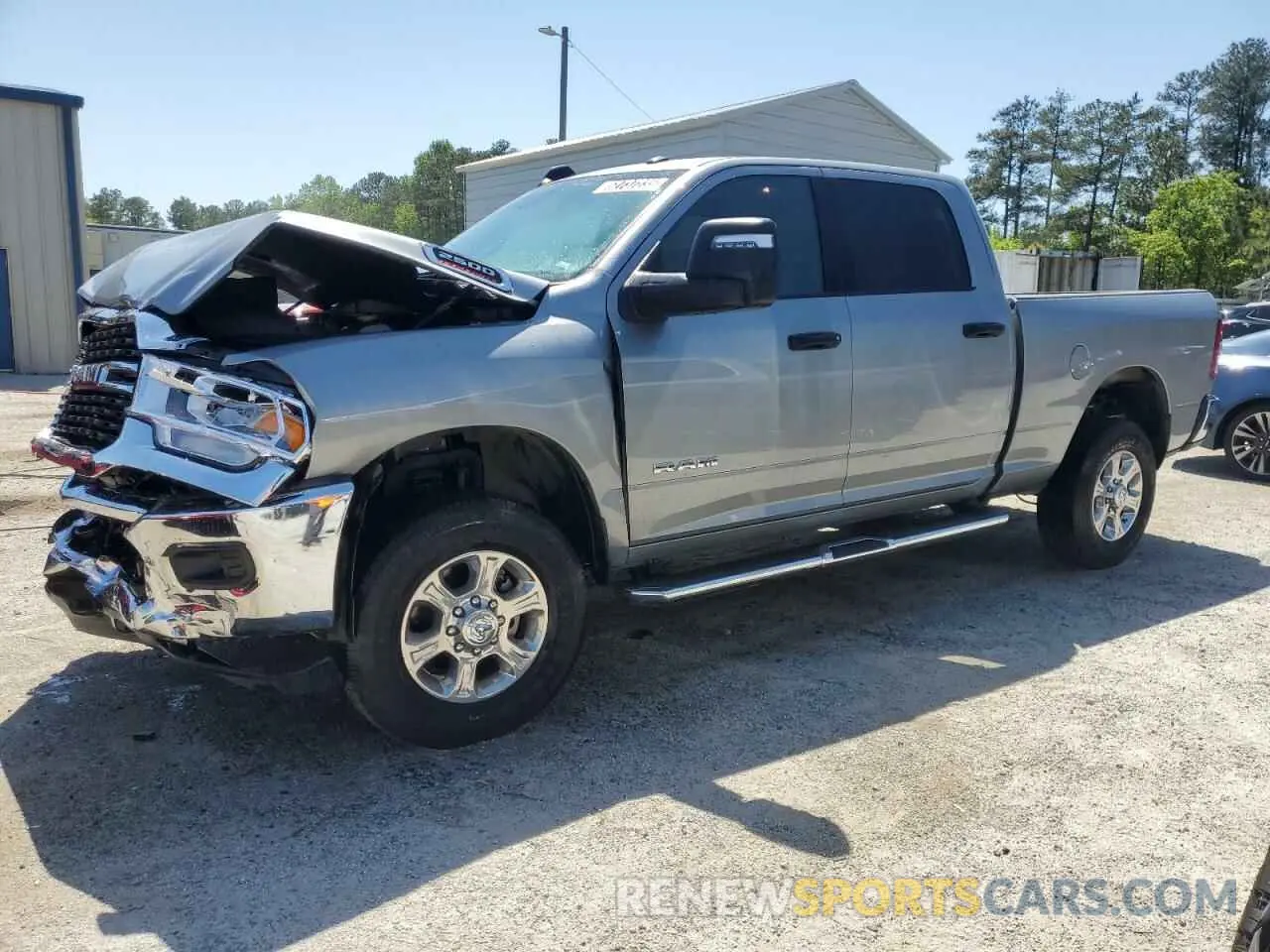 1 Photograph of a damaged car 3C6UR5DJ2RG354836 RAM 2500 2024