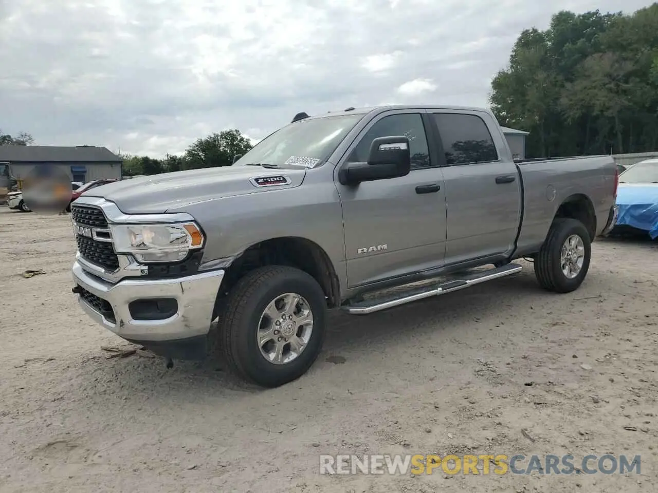 1 Photograph of a damaged car 3C6UR5DJ2RG406045 RAM 2500 2024
