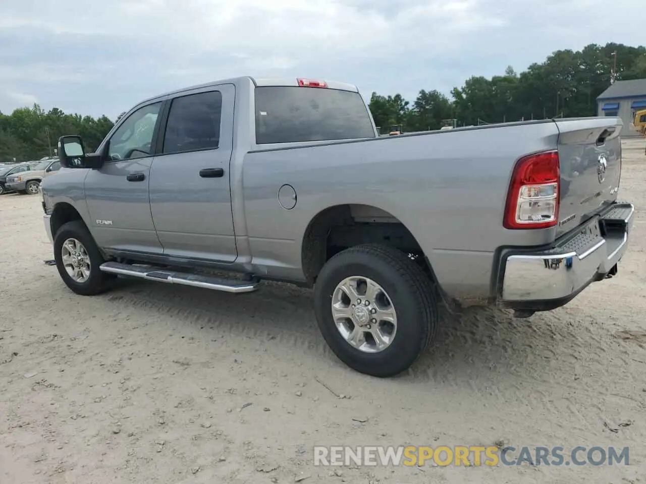 2 Photograph of a damaged car 3C6UR5DJ2RG406045 RAM 2500 2024