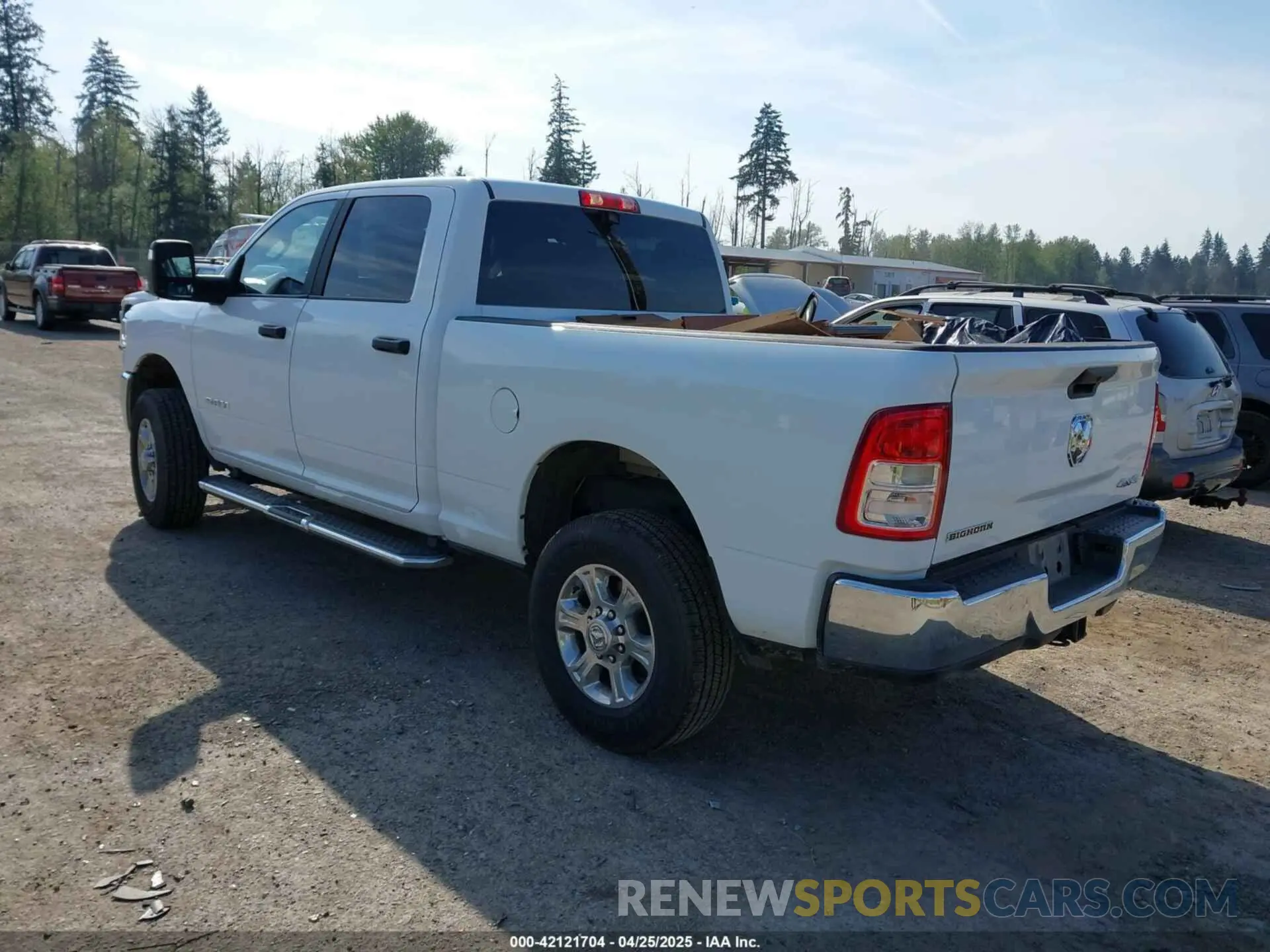 3 Photograph of a damaged car 3C6UR5DJ3RG275904 RAM 2500 2024