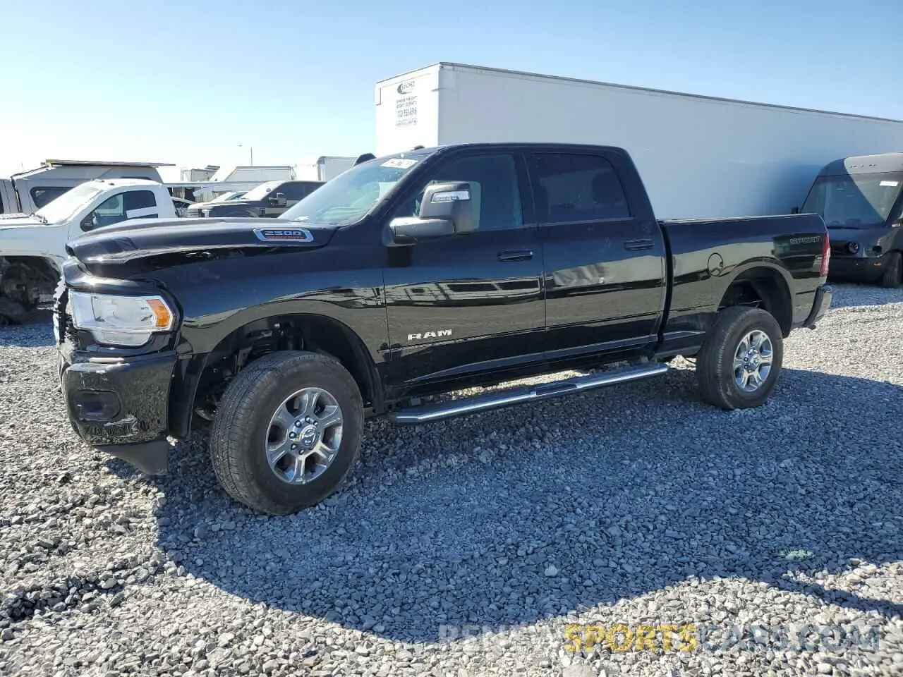 1 Photograph of a damaged car 3C6UR5DJ3RG387103 RAM 2500 2024