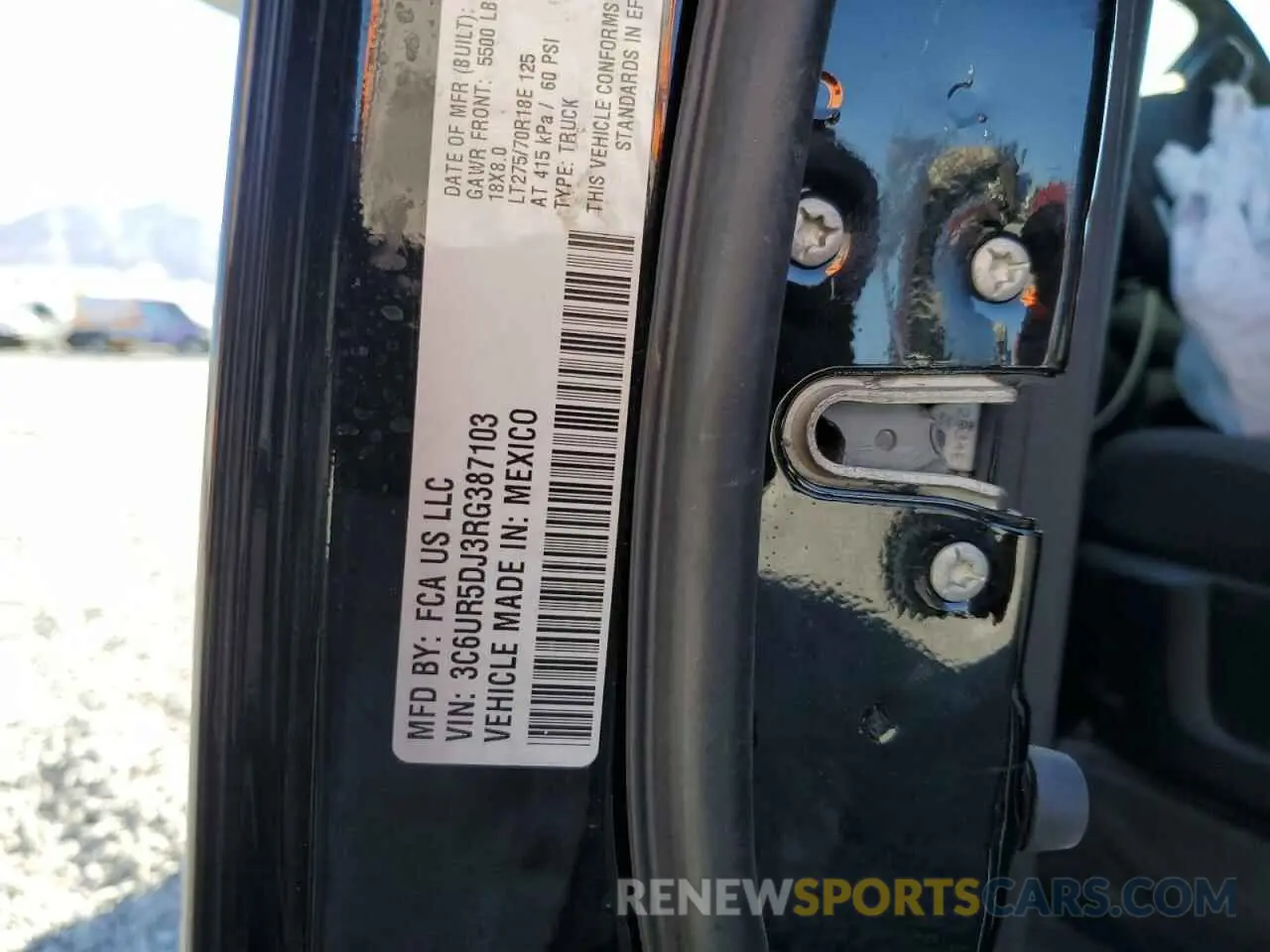 13 Photograph of a damaged car 3C6UR5DJ3RG387103 RAM 2500 2024