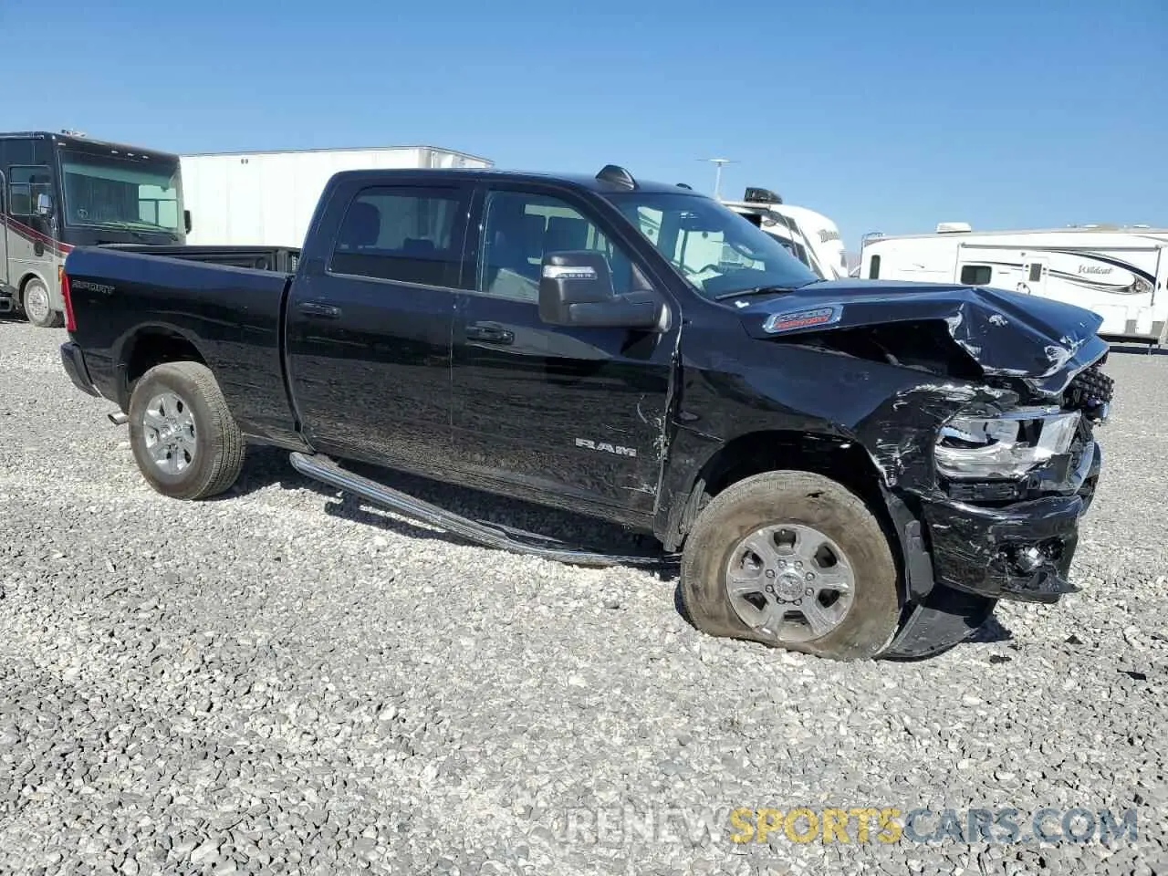4 Photograph of a damaged car 3C6UR5DJ3RG387103 RAM 2500 2024