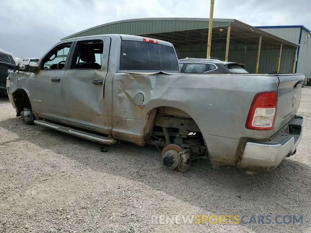 2 Photograph of a damaged car 3C6UR5DJ4RG348231 RAM 2500 2024