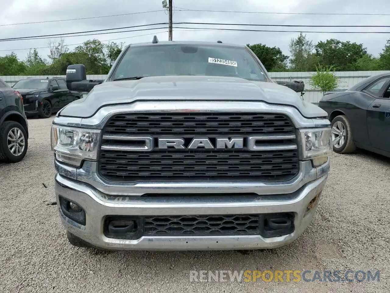 5 Photograph of a damaged car 3C6UR5DJ4RG348231 RAM 2500 2024