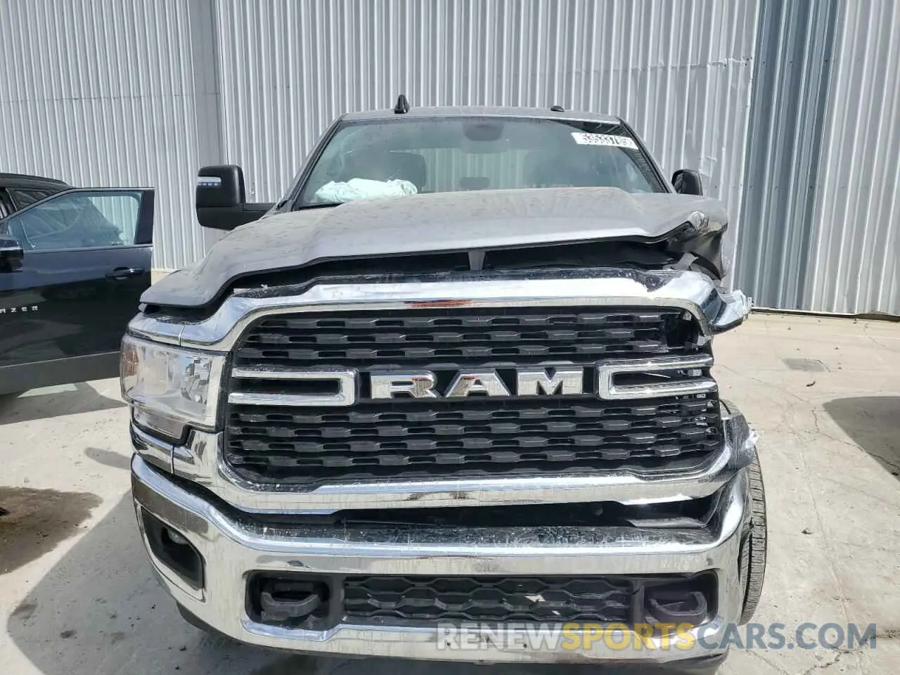 5 Photograph of a damaged car 3C6UR5DJ6RG385894 RAM 2500 2024