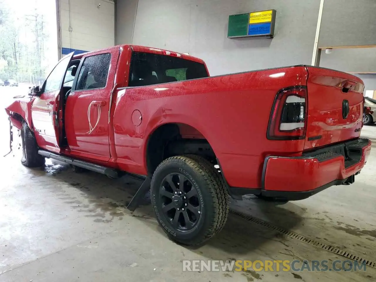 2 Photograph of a damaged car 3C6UR5DJ6RG397057 RAM 2500 2024