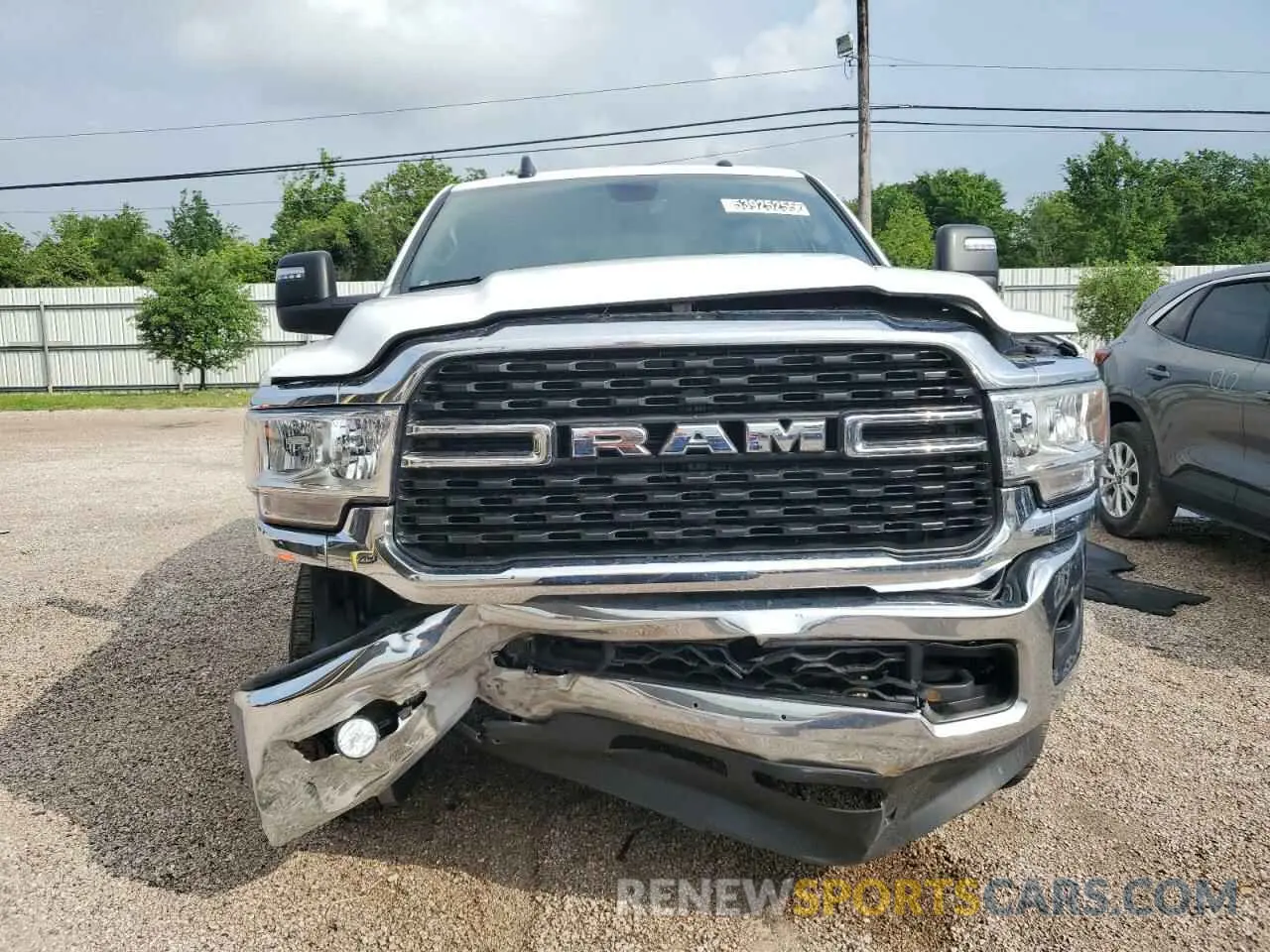 5 Photograph of a damaged car 3C6UR5DJ7RG412973 RAM 2500 2024