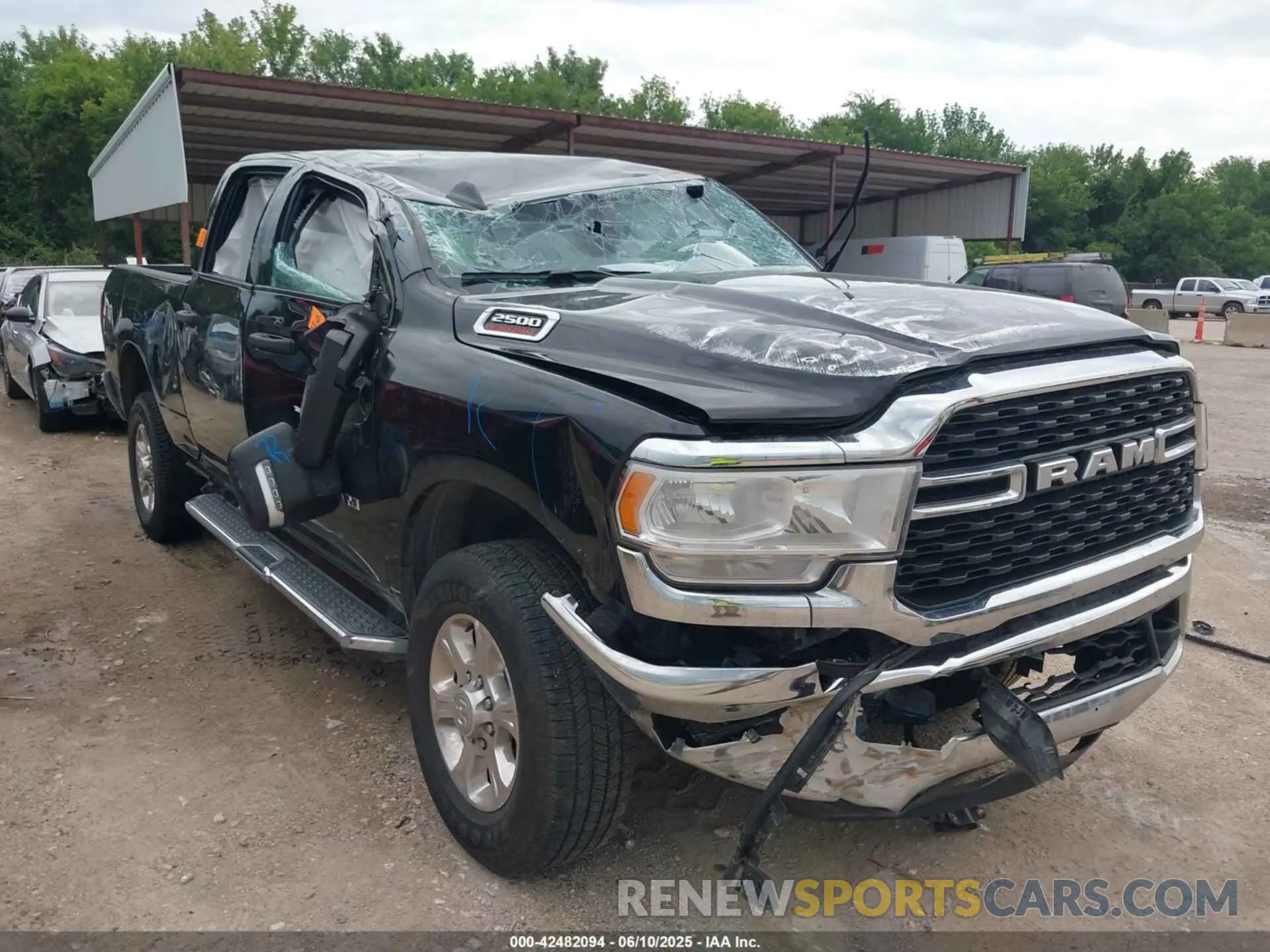 1 Photograph of a damaged car 3C6UR5DJ9RG365218 RAM 2500 2024