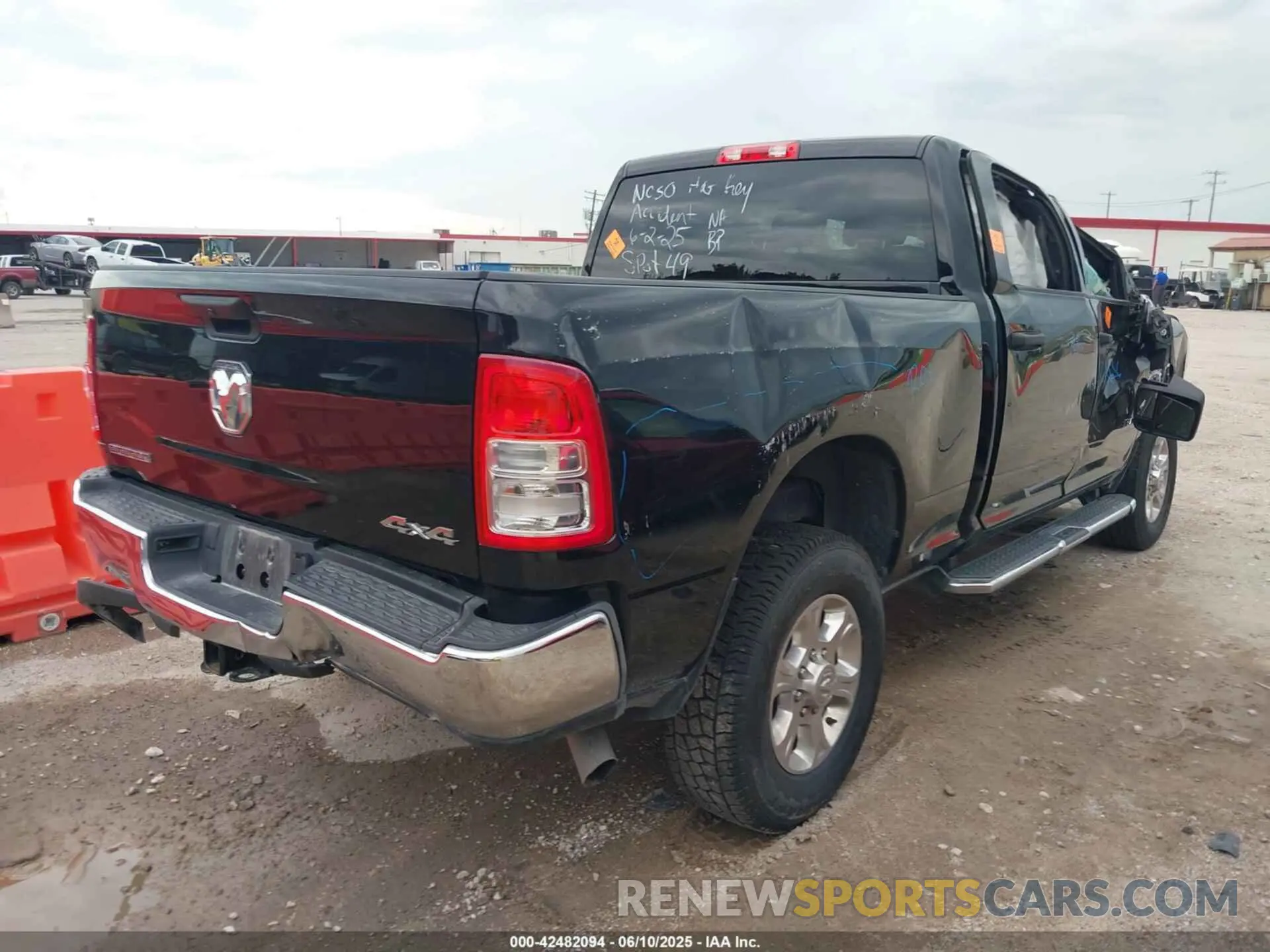 4 Photograph of a damaged car 3C6UR5DJ9RG365218 RAM 2500 2024