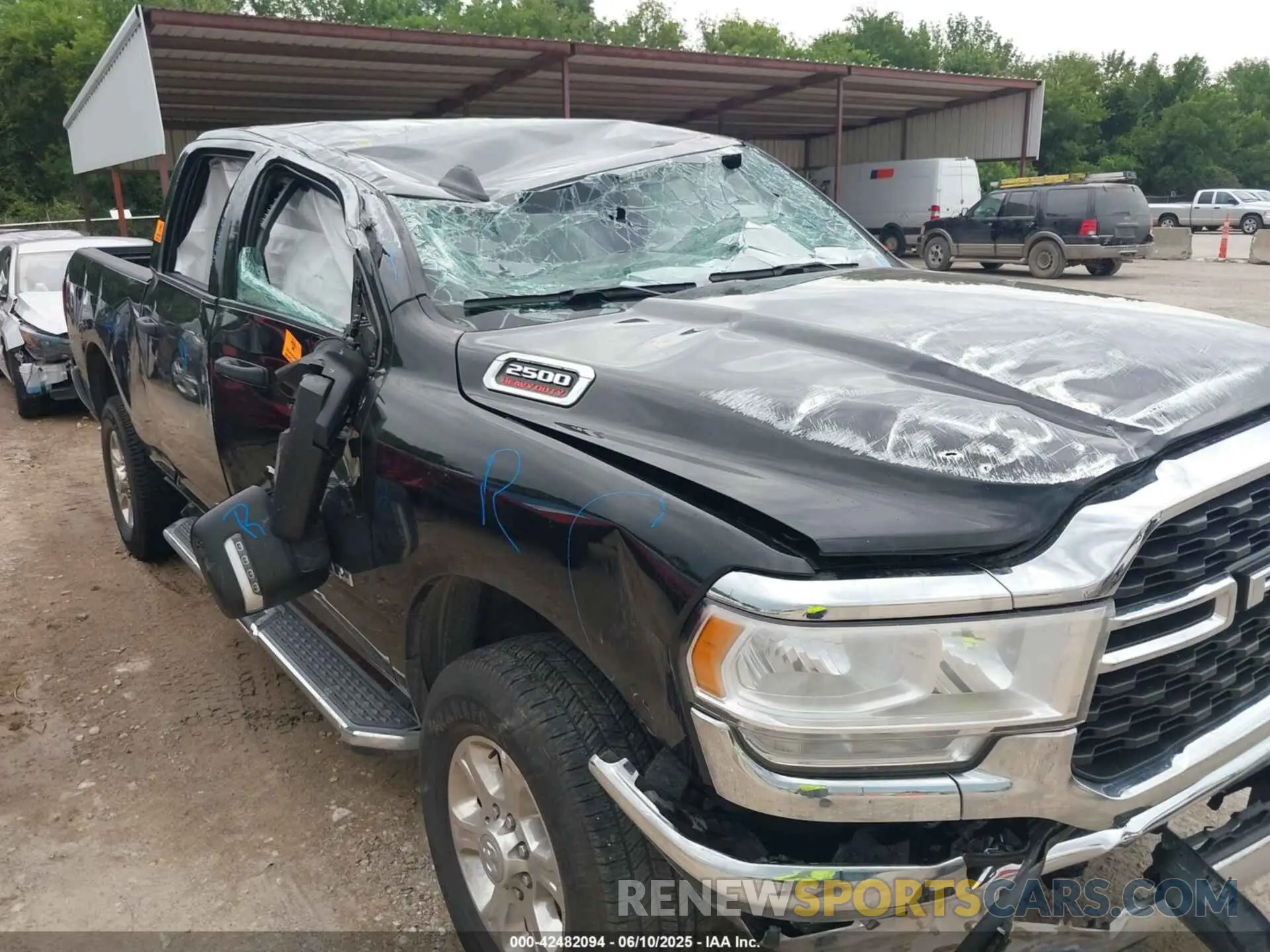 6 Photograph of a damaged car 3C6UR5DJ9RG365218 RAM 2500 2024