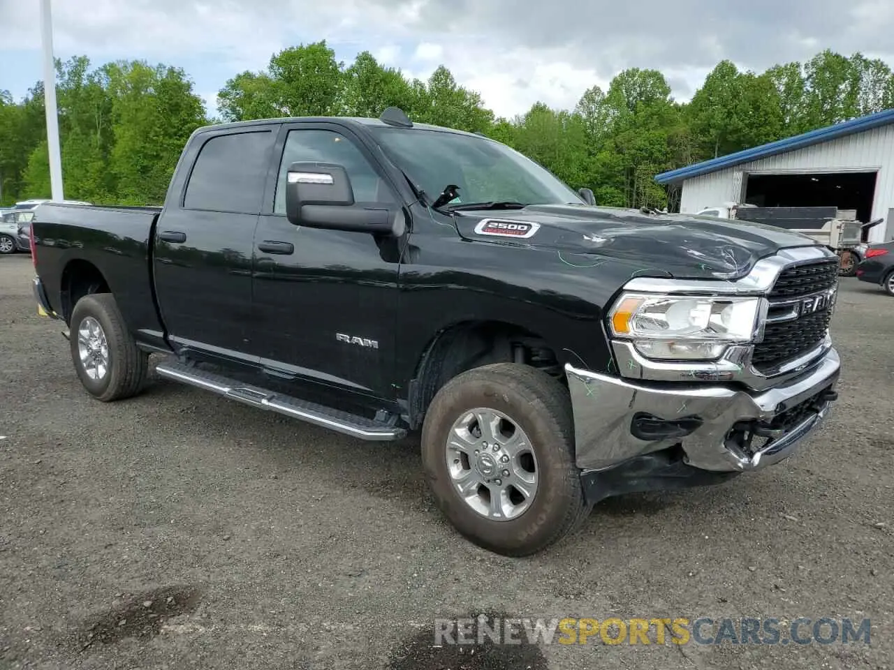 4 Photograph of a damaged car 3C6UR5DJXRG249736 RAM 2500 2024