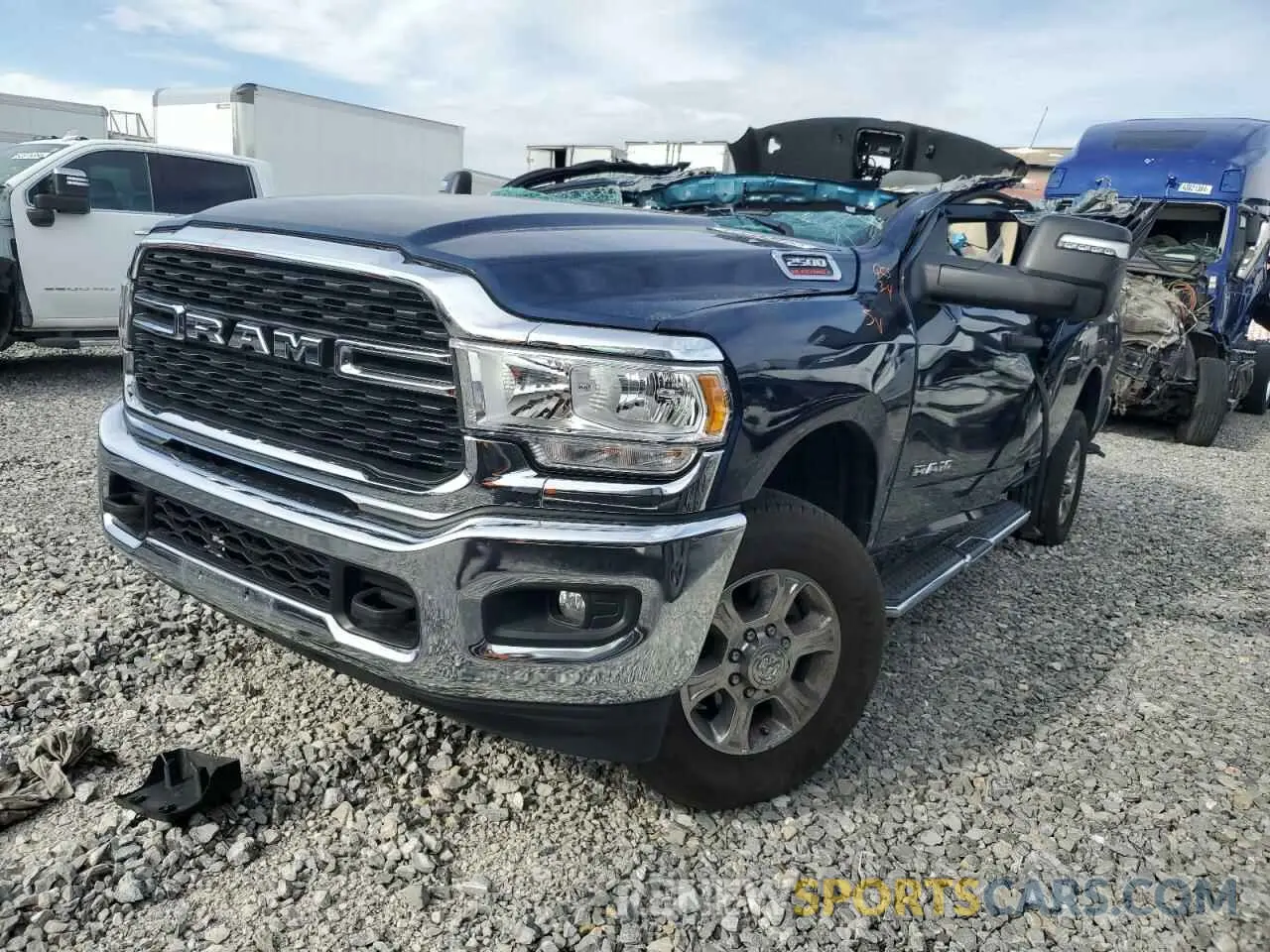 1 Photograph of a damaged car 3C6UR5DJXRG322927 RAM 2500 2024