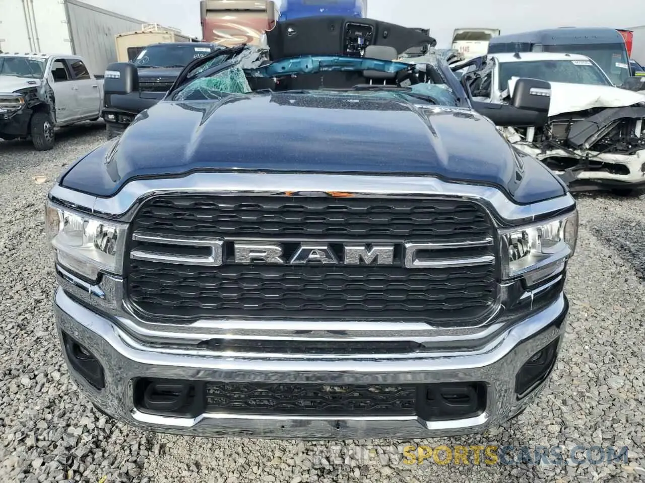 11 Photograph of a damaged car 3C6UR5DJXRG322927 RAM 2500 2024
