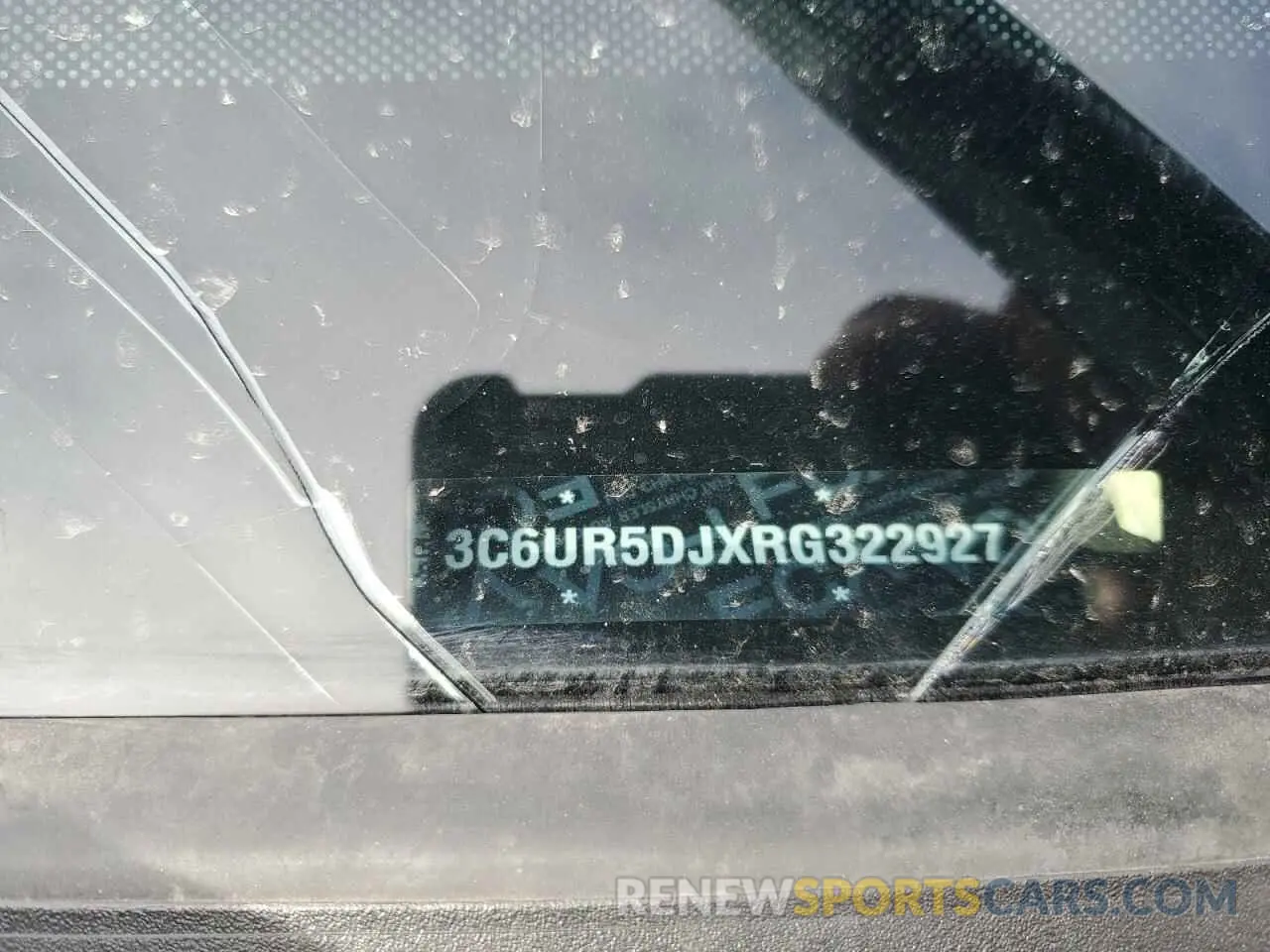 12 Photograph of a damaged car 3C6UR5DJXRG322927 RAM 2500 2024