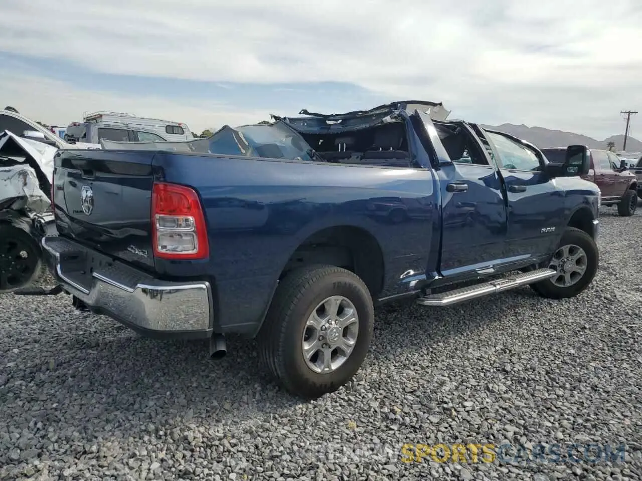 3 Photograph of a damaged car 3C6UR5DJXRG322927 RAM 2500 2024