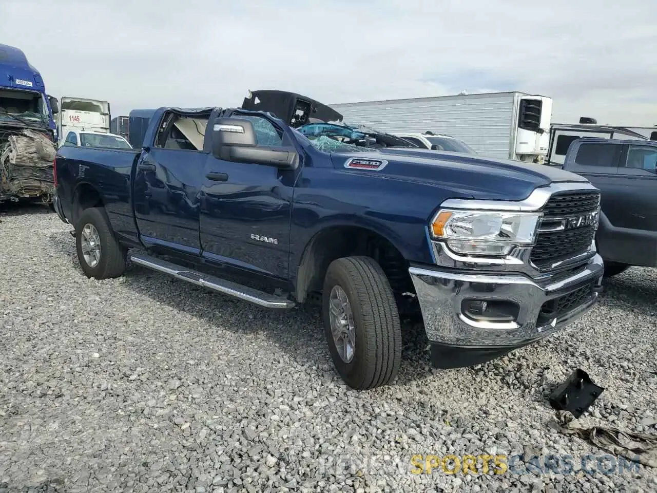 4 Photograph of a damaged car 3C6UR5DJXRG322927 RAM 2500 2024