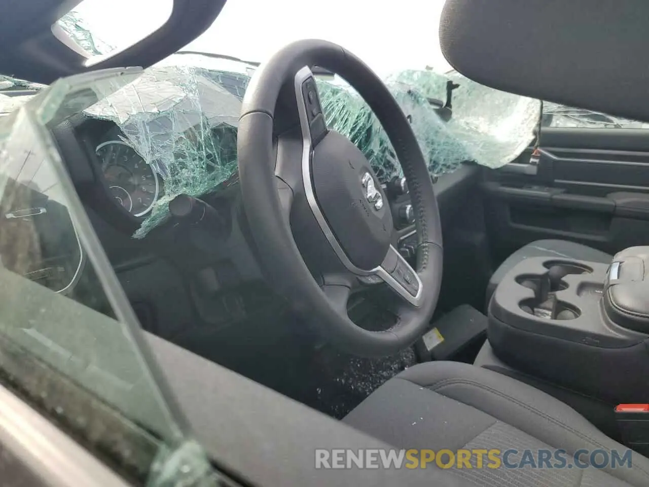 8 Photograph of a damaged car 3C6UR5DJXRG322927 RAM 2500 2024
