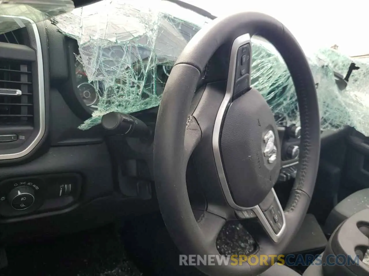9 Photograph of a damaged car 3C6UR5DJXRG322927 RAM 2500 2024