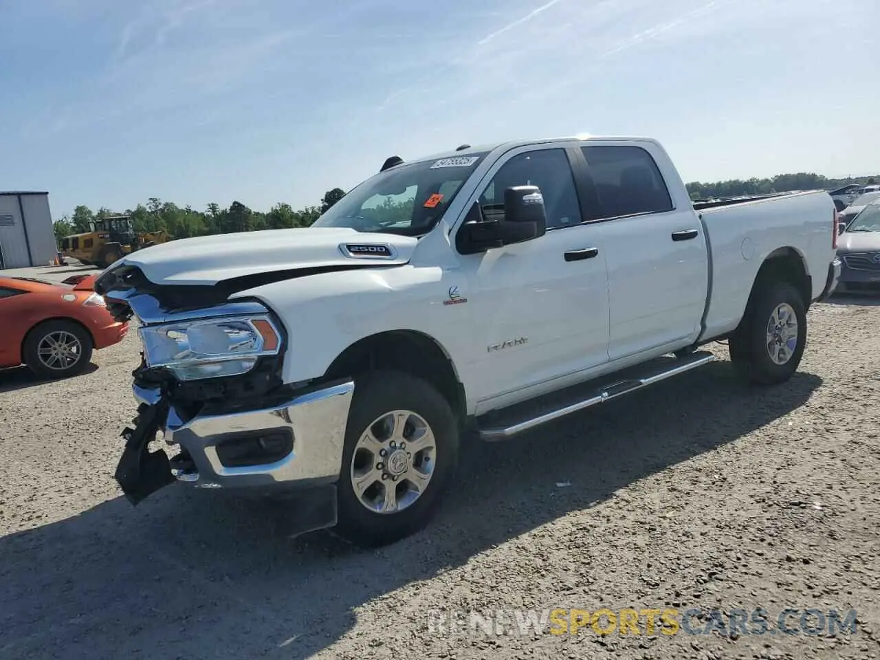 1 Photograph of a damaged car 3C6UR5DL0RG338202 RAM 2500 2024