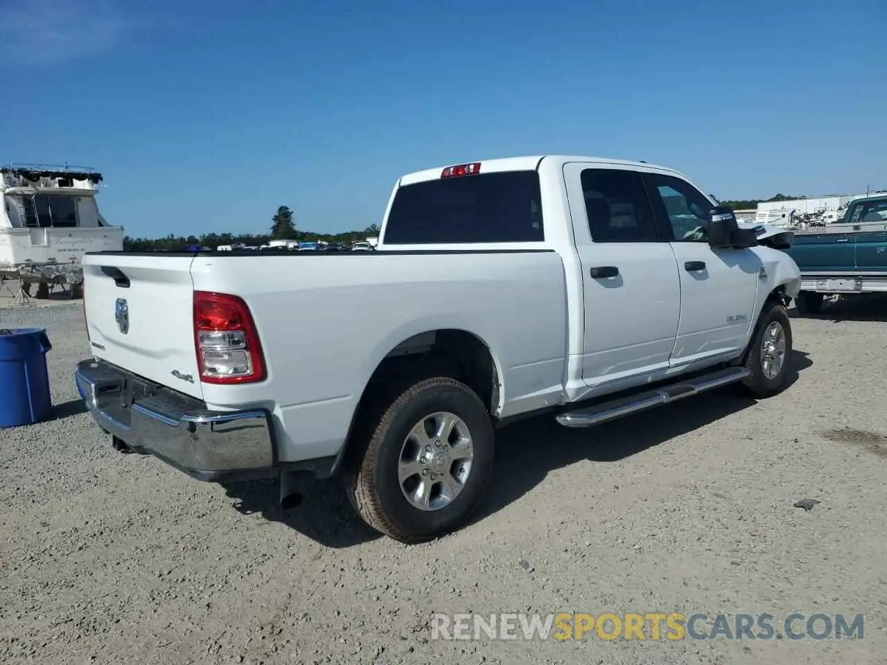 3 Photograph of a damaged car 3C6UR5DL0RG338202 RAM 2500 2024
