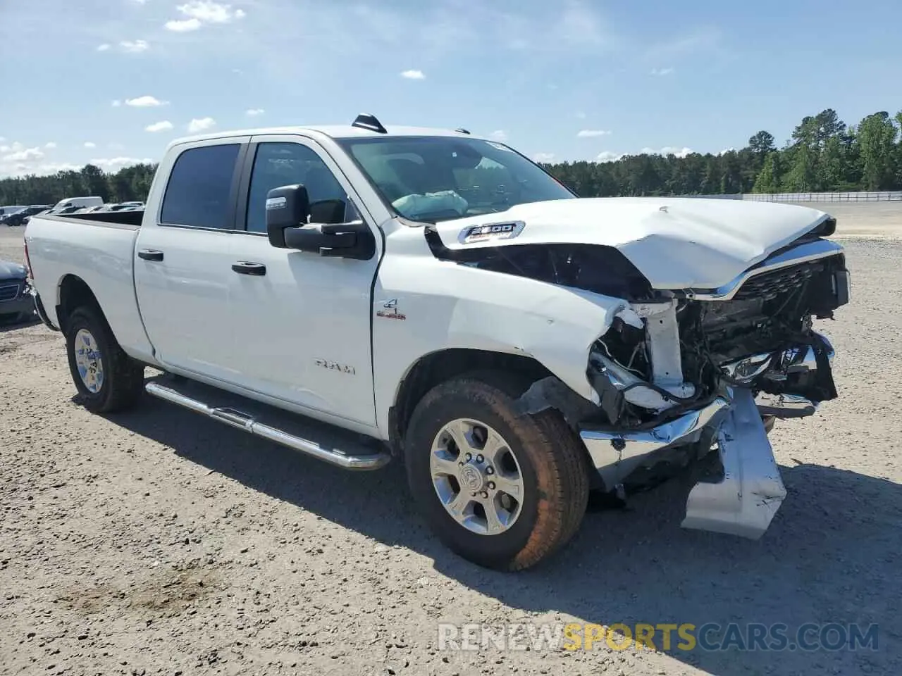 4 Photograph of a damaged car 3C6UR5DL0RG338202 RAM 2500 2024