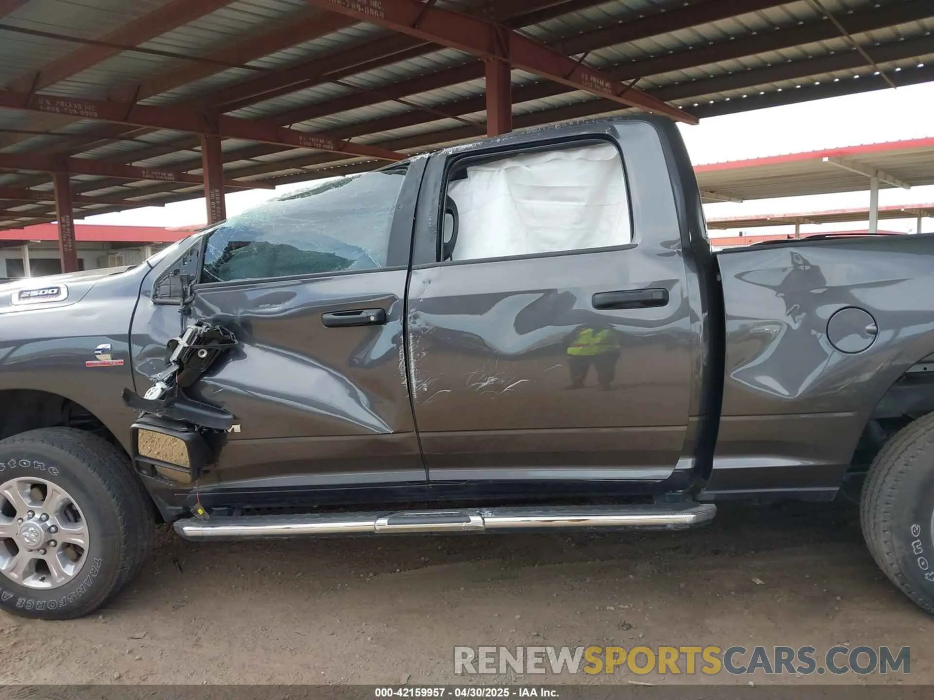 13 Photograph of a damaged car 3C6UR5DL1RG105526 RAM 2500 2024