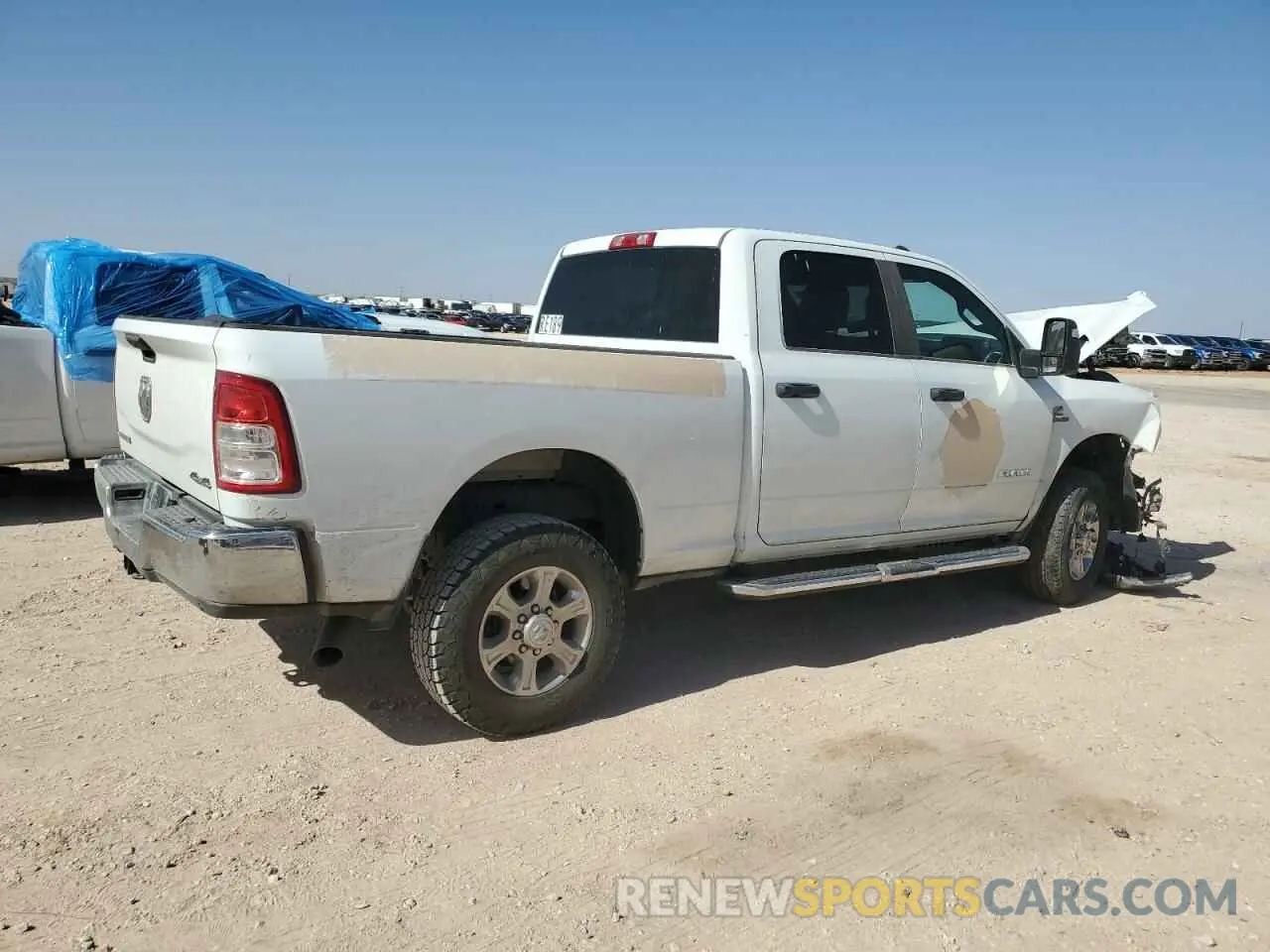 3 Photograph of a damaged car 3C6UR5DL1RG106160 RAM 2500 2024