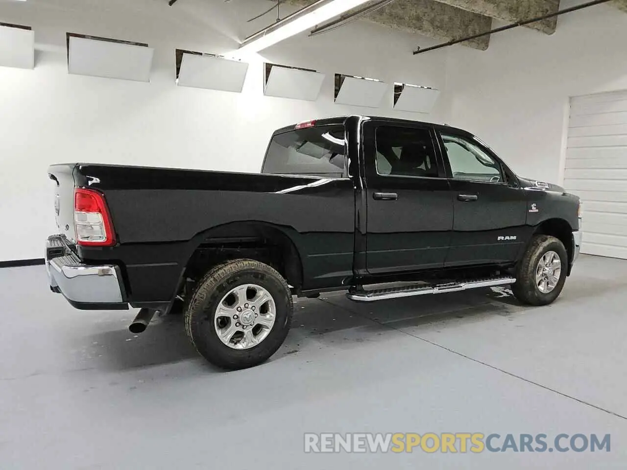 3 Photograph of a damaged car 3C6UR5DL1RG153608 RAM 2500 2024